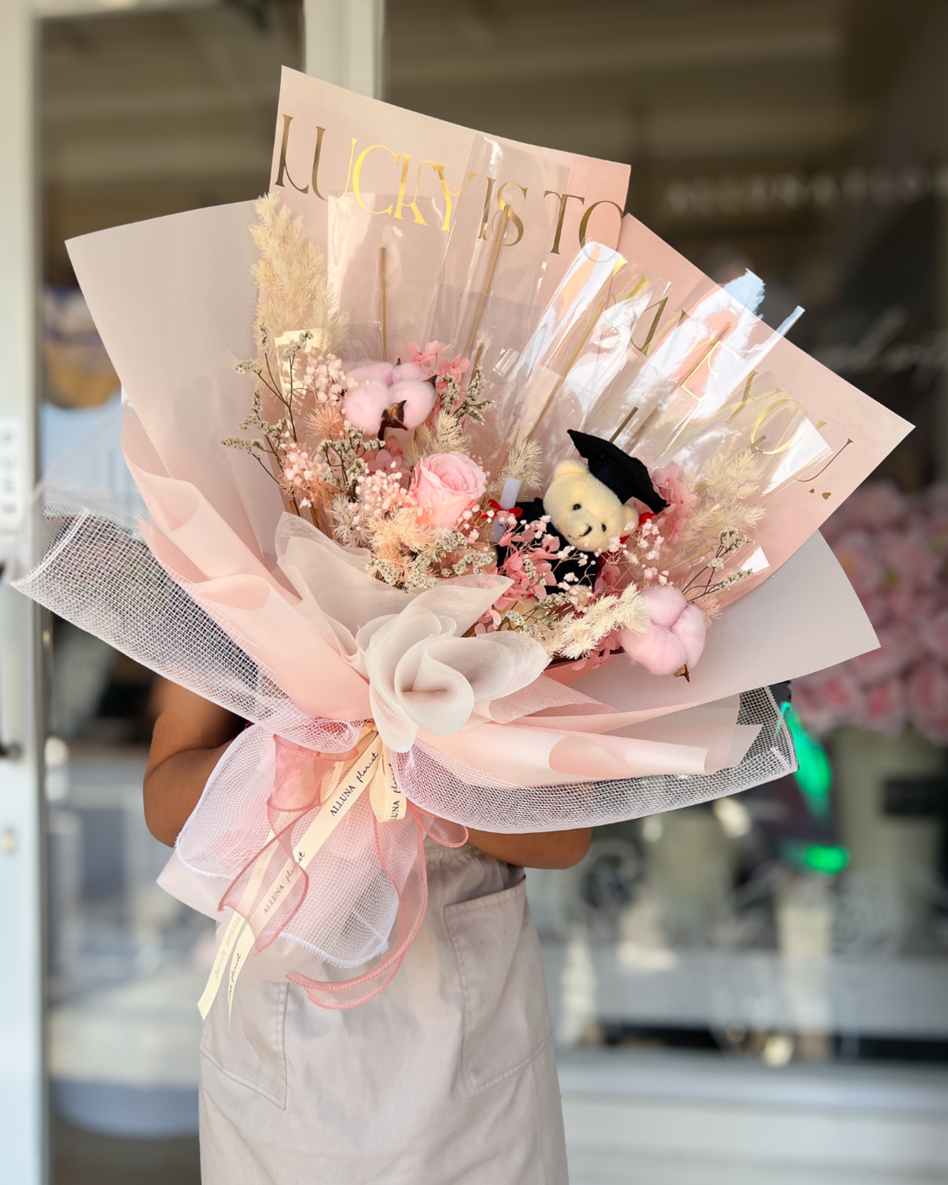 an abstract photo of a curved building with a blue sky in the background