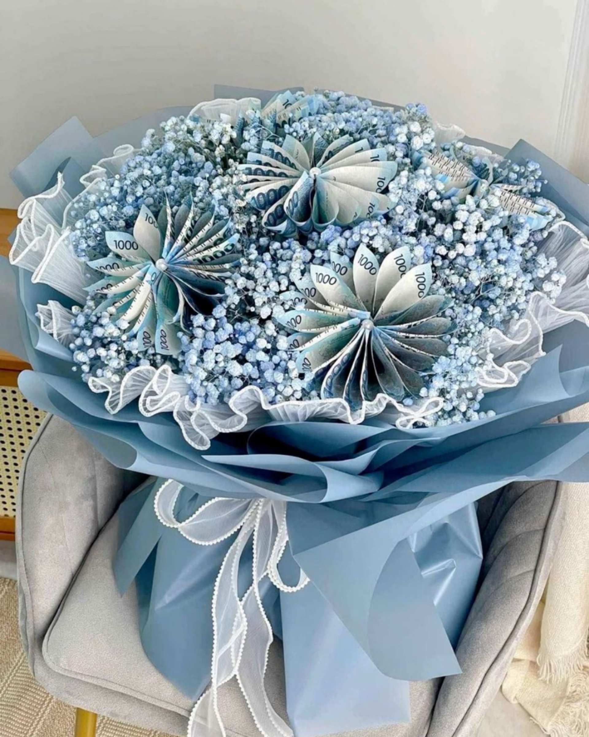 an abstract photo of a curved building with a blue sky in the background