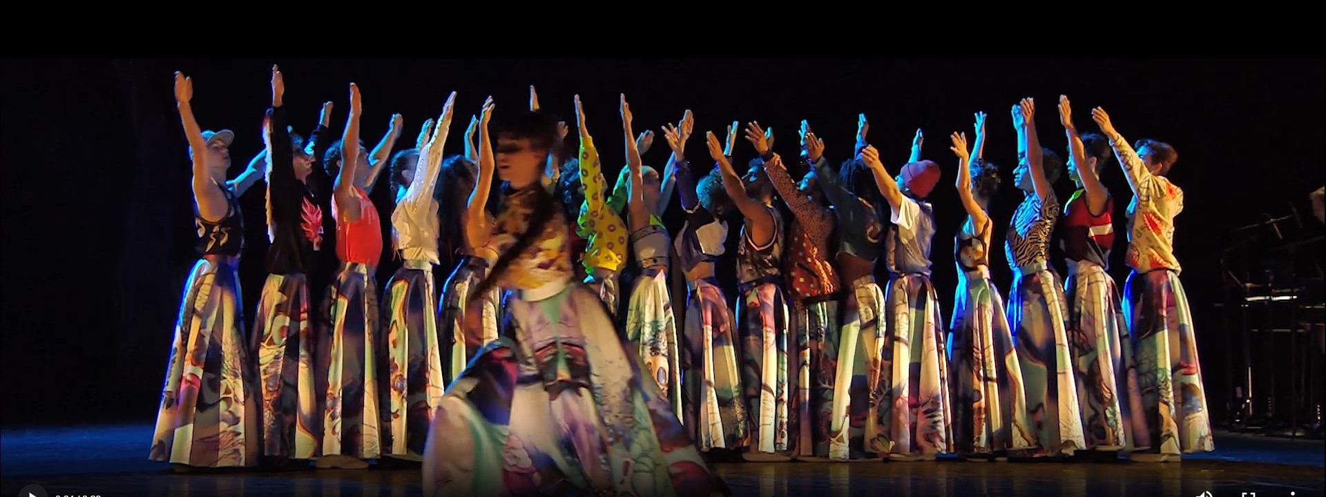 woman wearing yellow long-sleeved dress under white clouds and blue sky during daytime