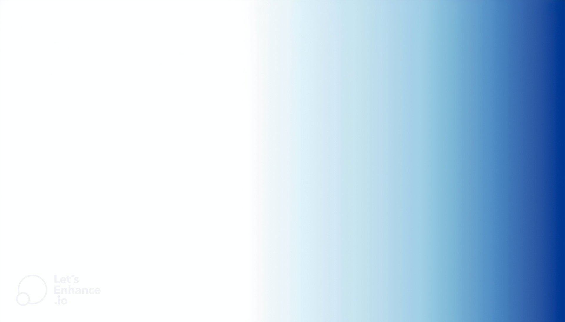 an abstract photo of a curved building with a blue sky in the background