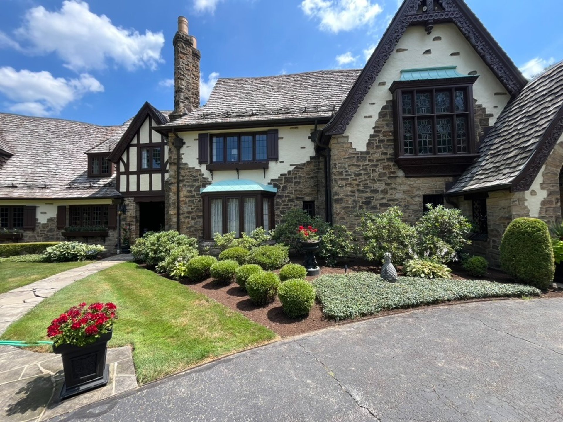 black and brown leather padded tub sofa