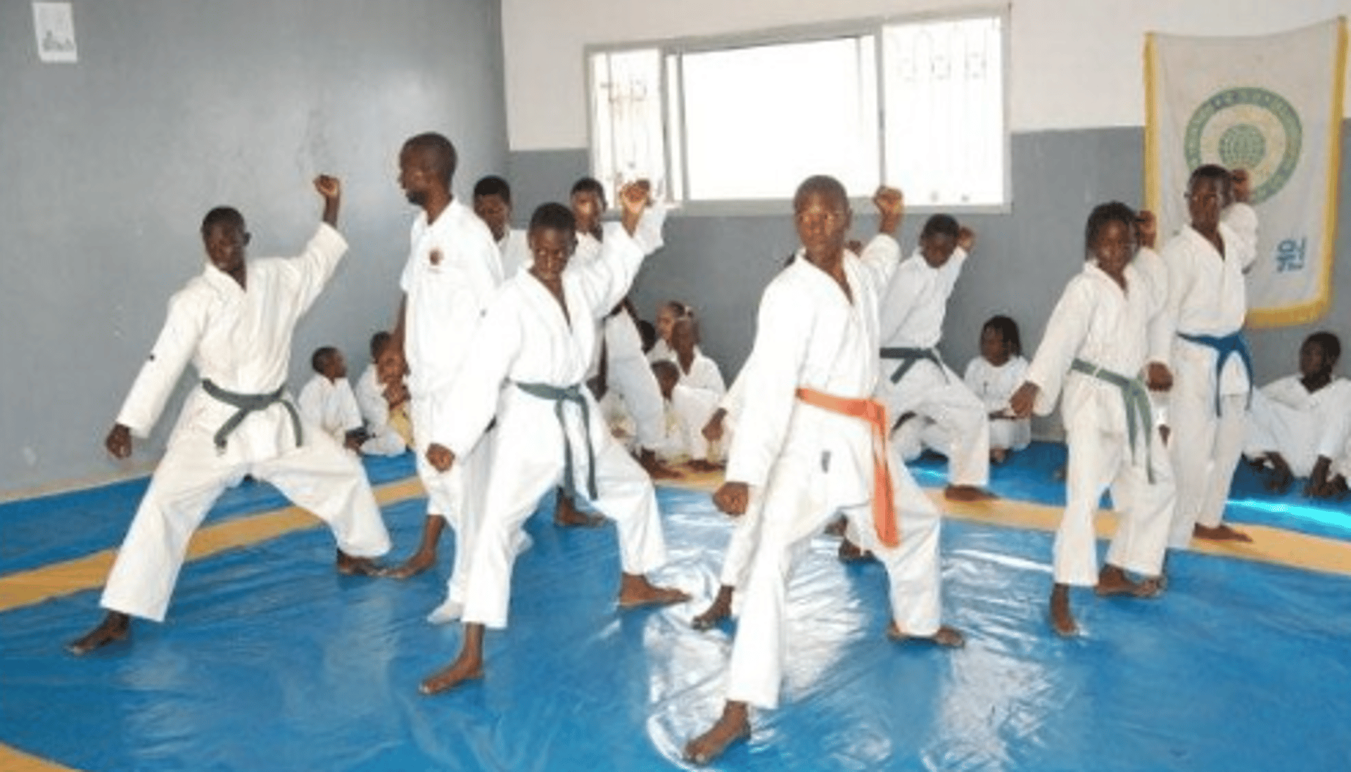woman wearing yellow long-sleeved dress under white clouds and blue sky during daytime