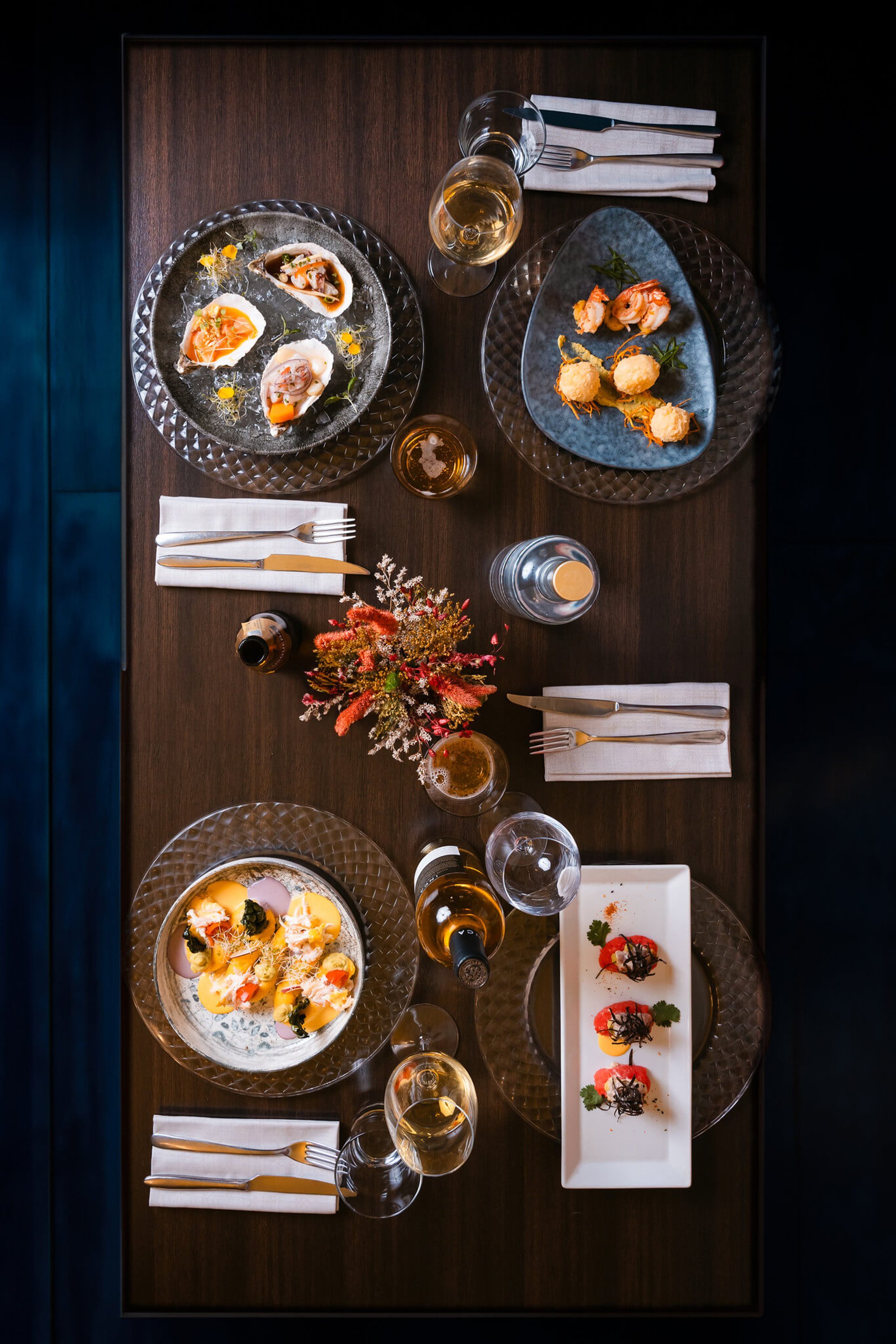 woman wearing yellow long-sleeved dress under white clouds and blue sky during daytime
