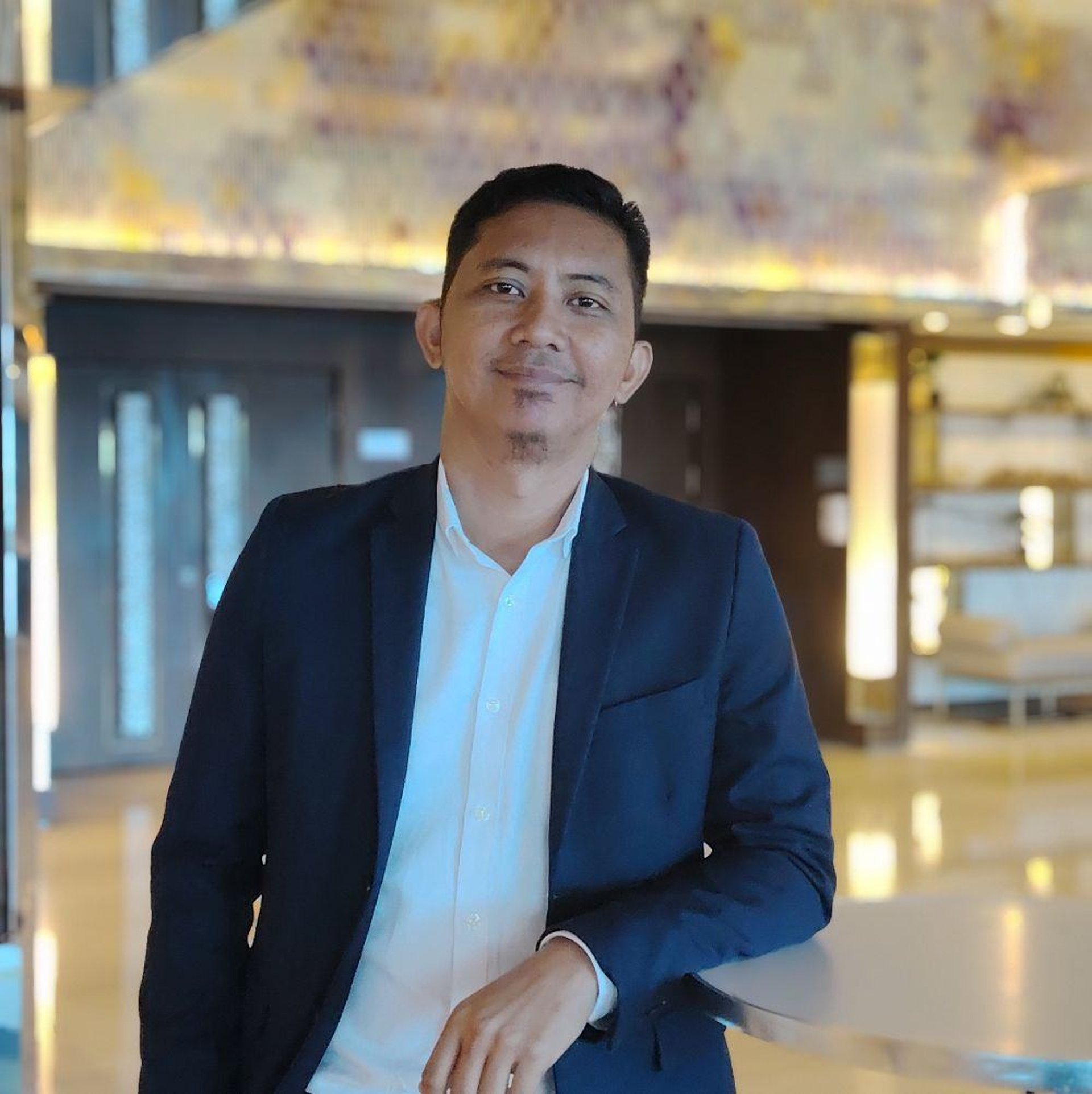 black and brown leather padded tub sofa