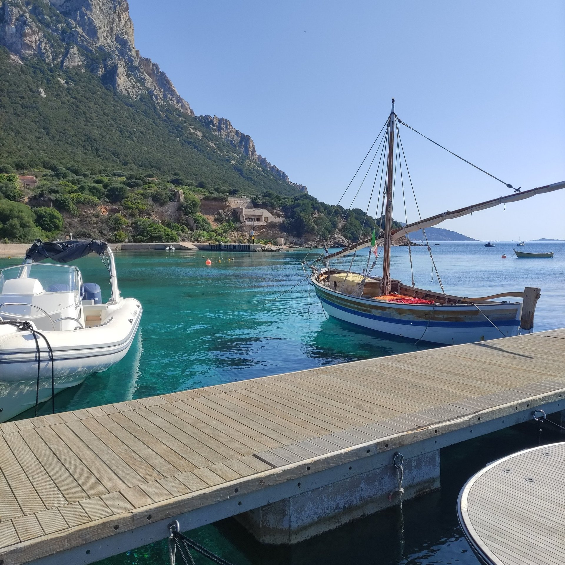 woman wearing yellow long-sleeved dress under white clouds and blue sky during daytime