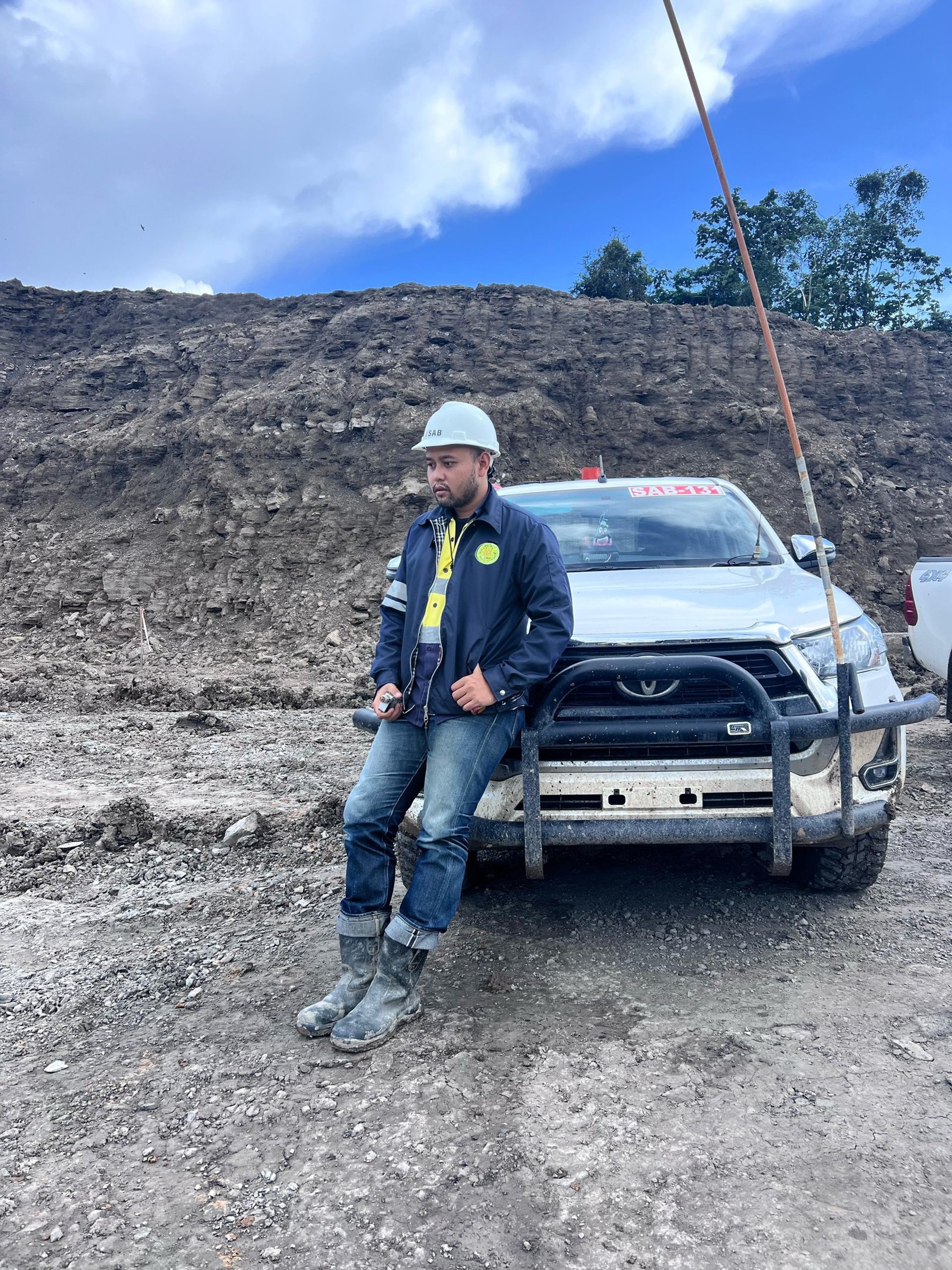 person wearing grey knit sweater