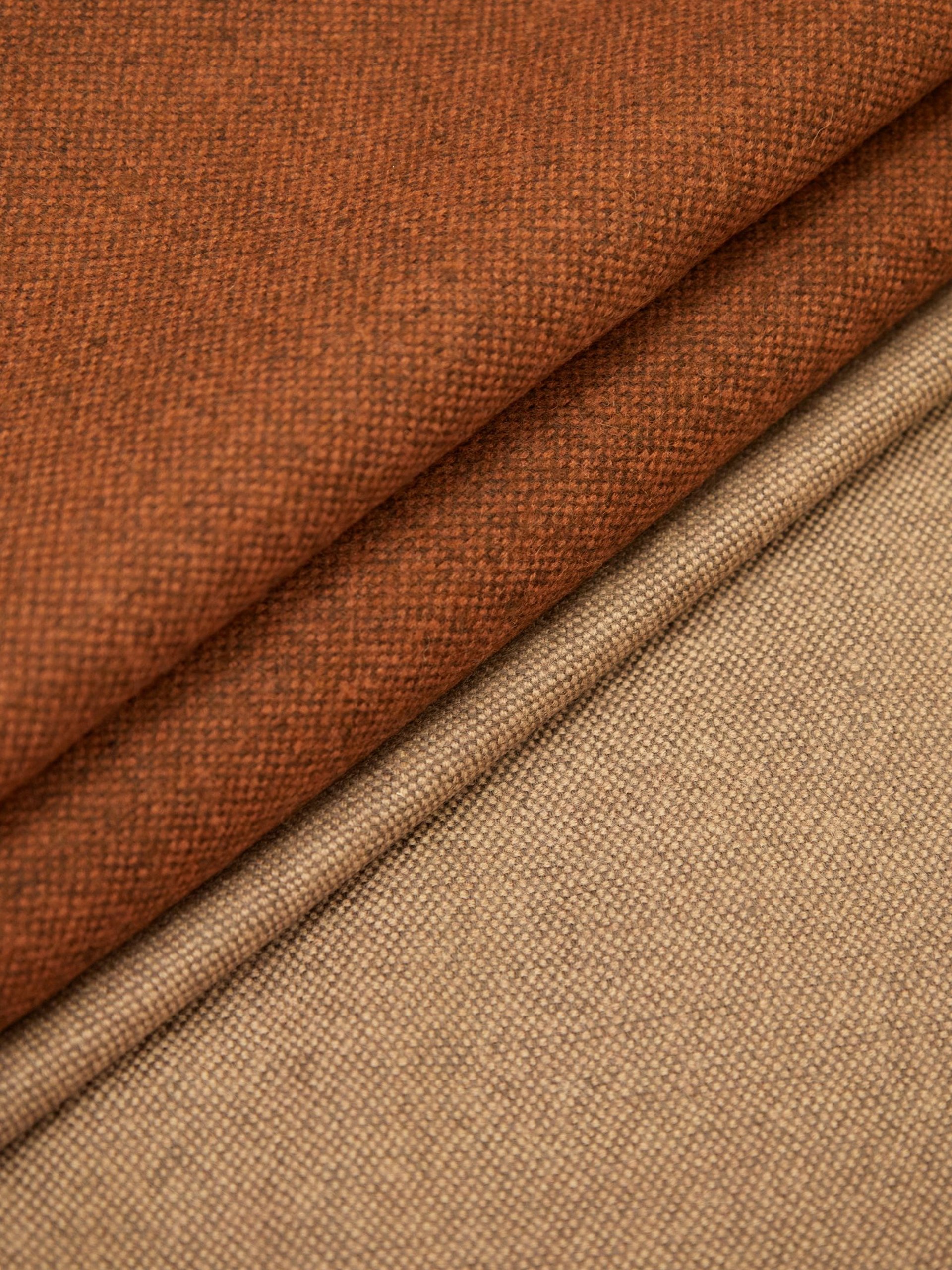 round brown bowl on wooden surface