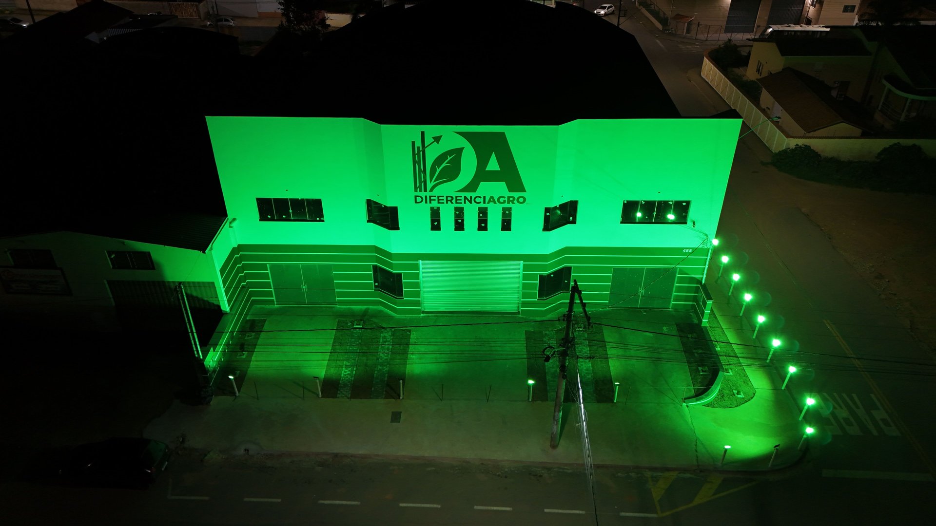 an abstract photo of a curved building with a blue sky in the background