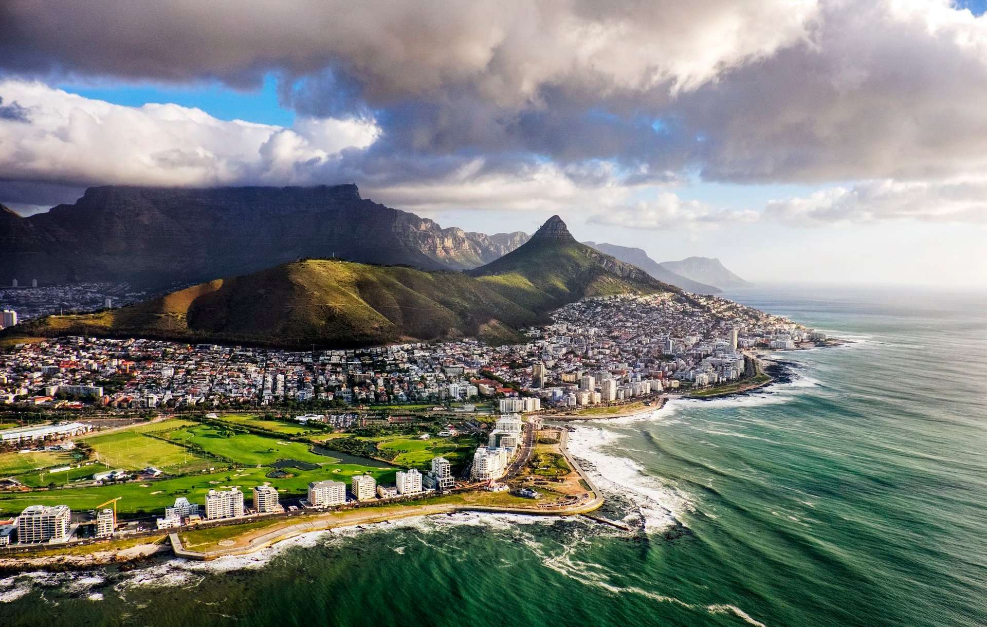 aerial view of city near mountain during daytime