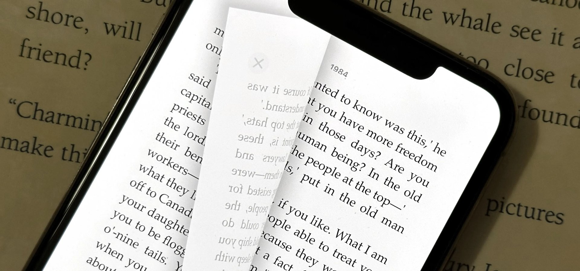 stack of books on white table