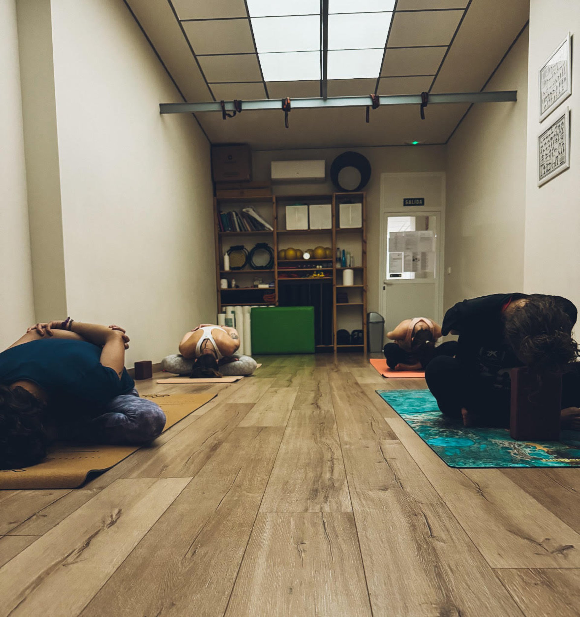 woman wearing yellow long-sleeved dress under white clouds and blue sky during daytime