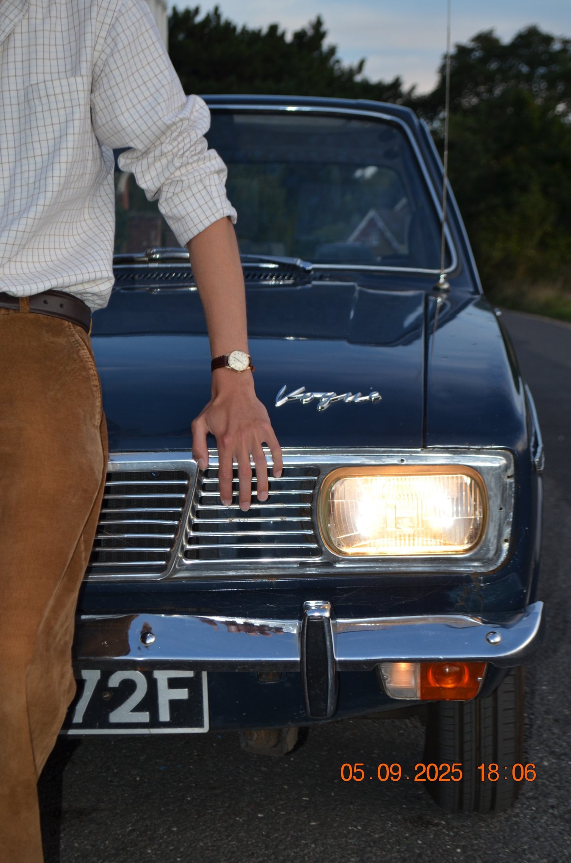 an abstract photo of a curved building with a blue sky in the background