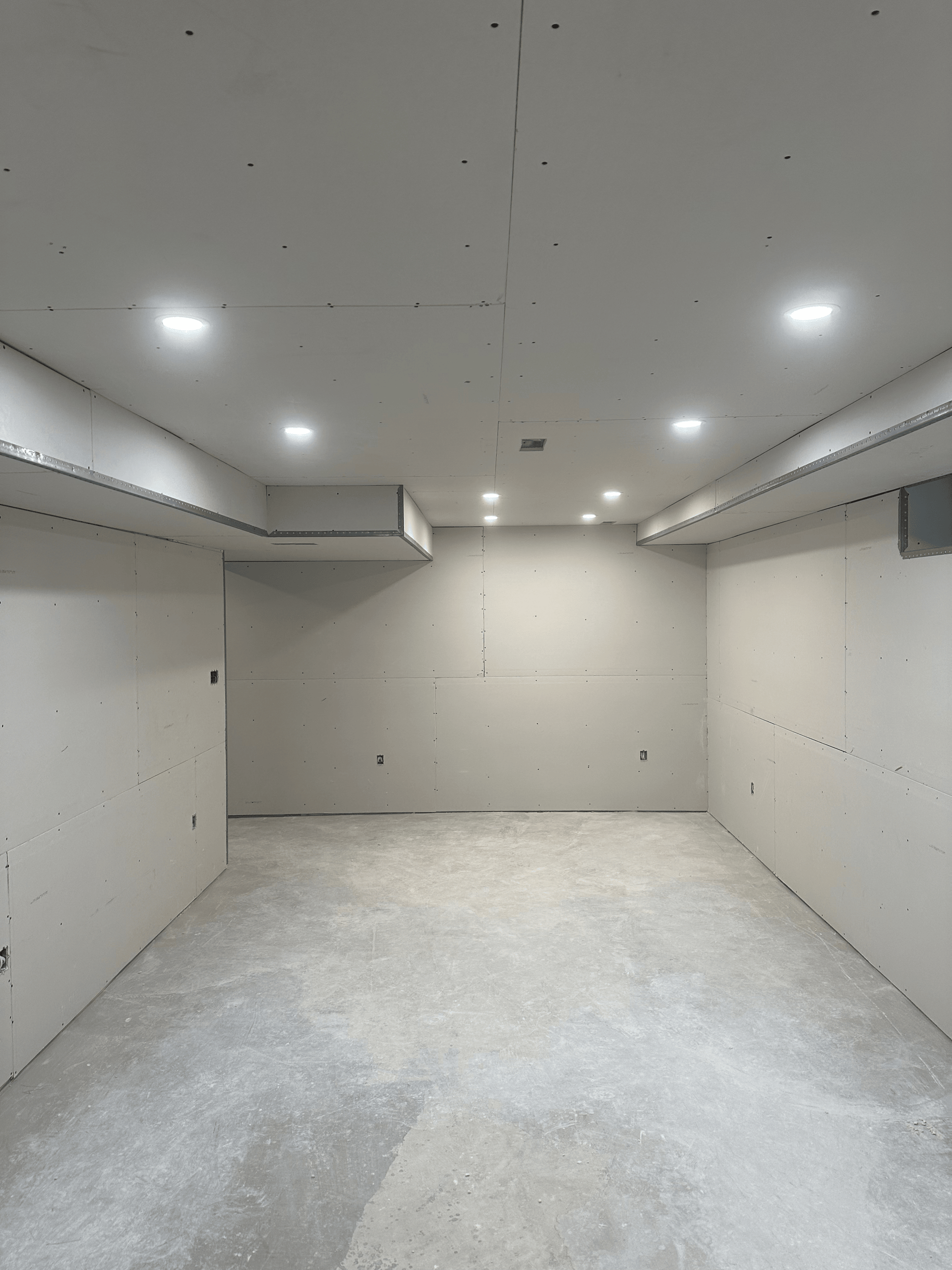 black and brown leather padded tub sofa