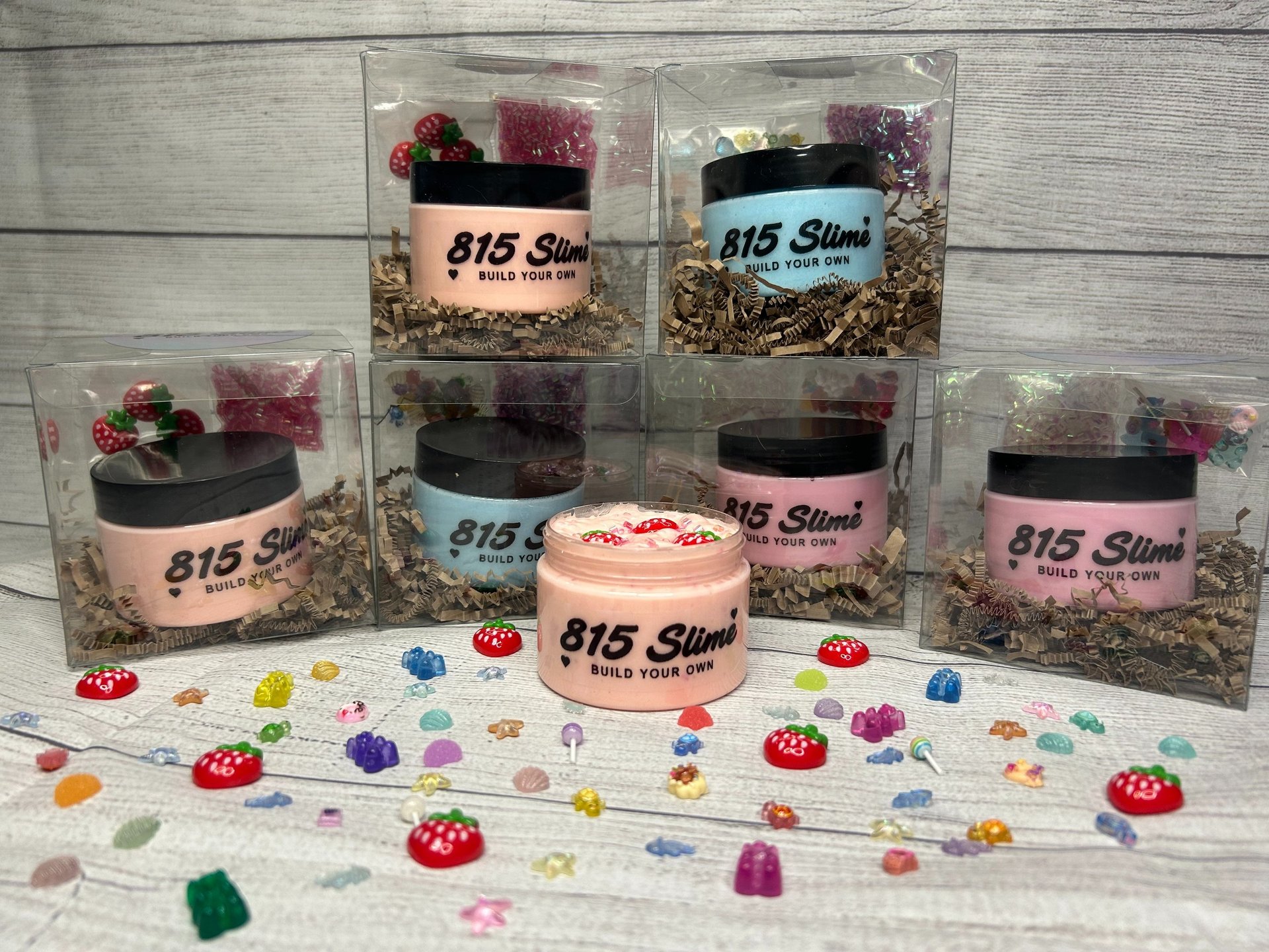 a group of people holding different colored flowers