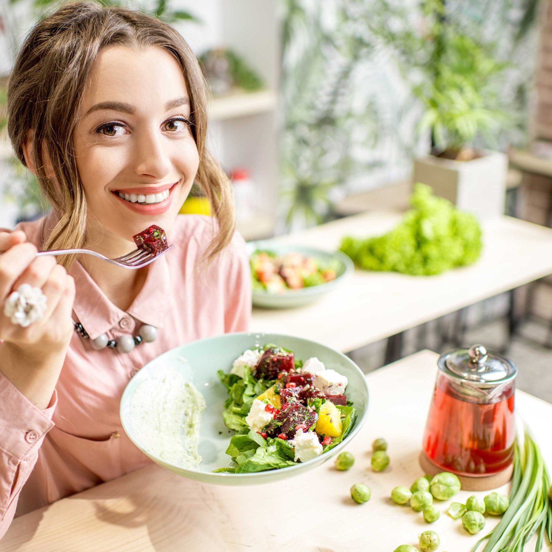 a table topped with plates and bowls of food