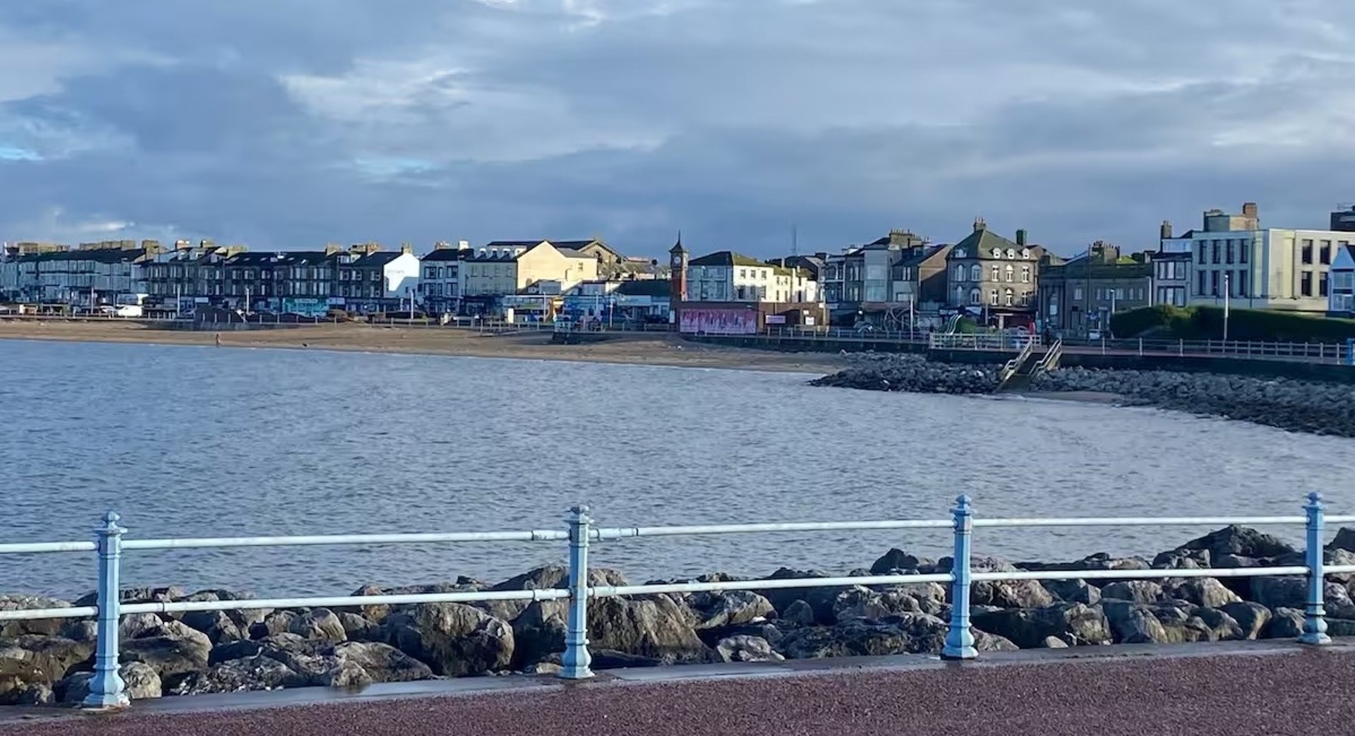 black and brown leather padded tub sofa