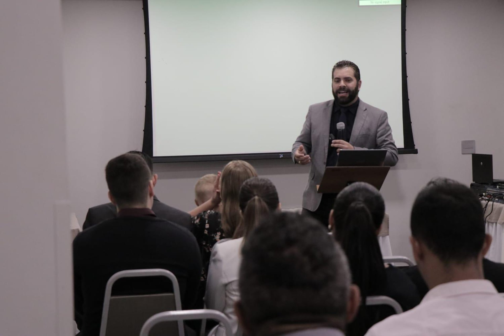an abstract photo of a curved building with a blue sky in the background
