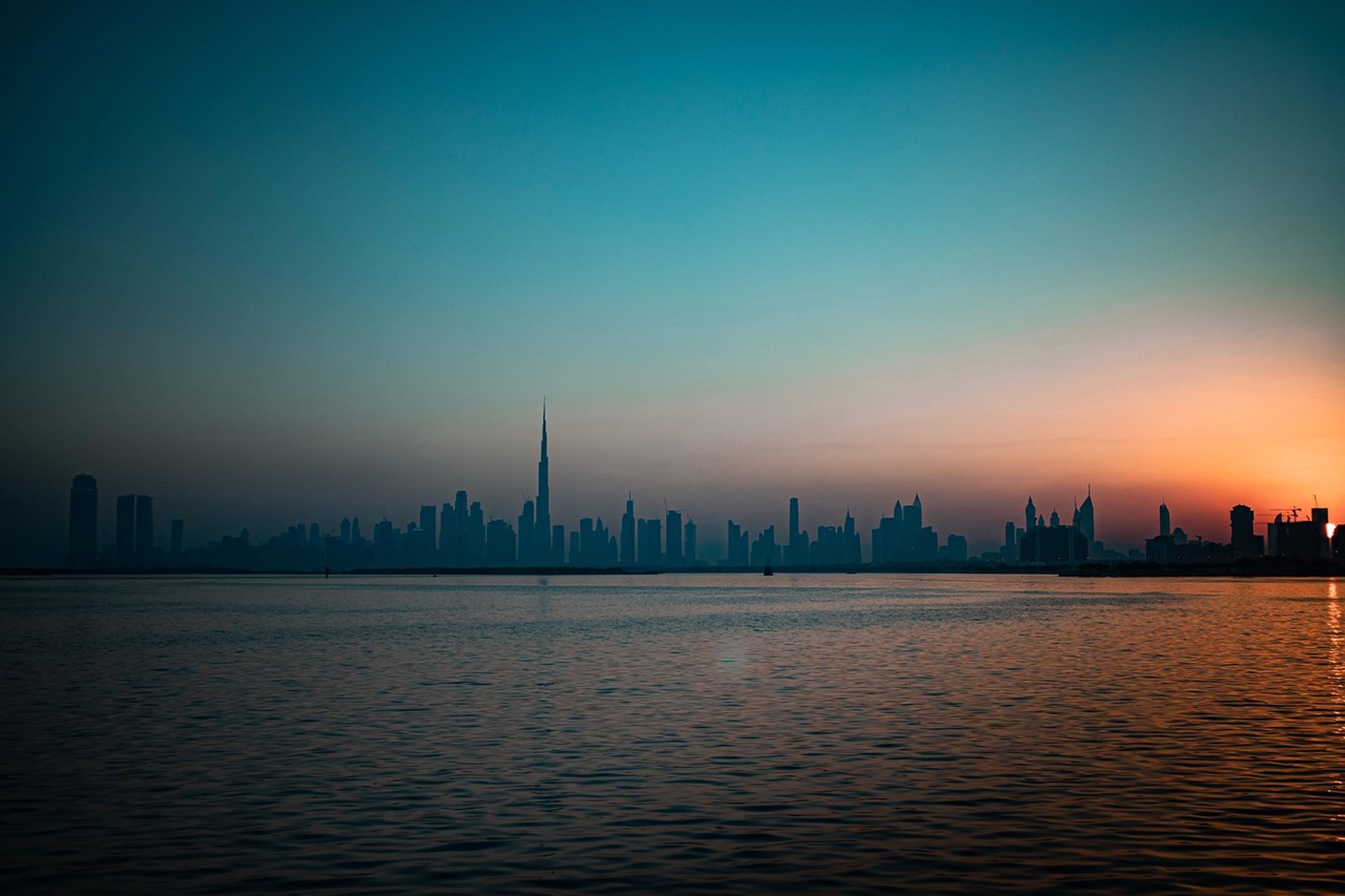 a very tall building towering over a city