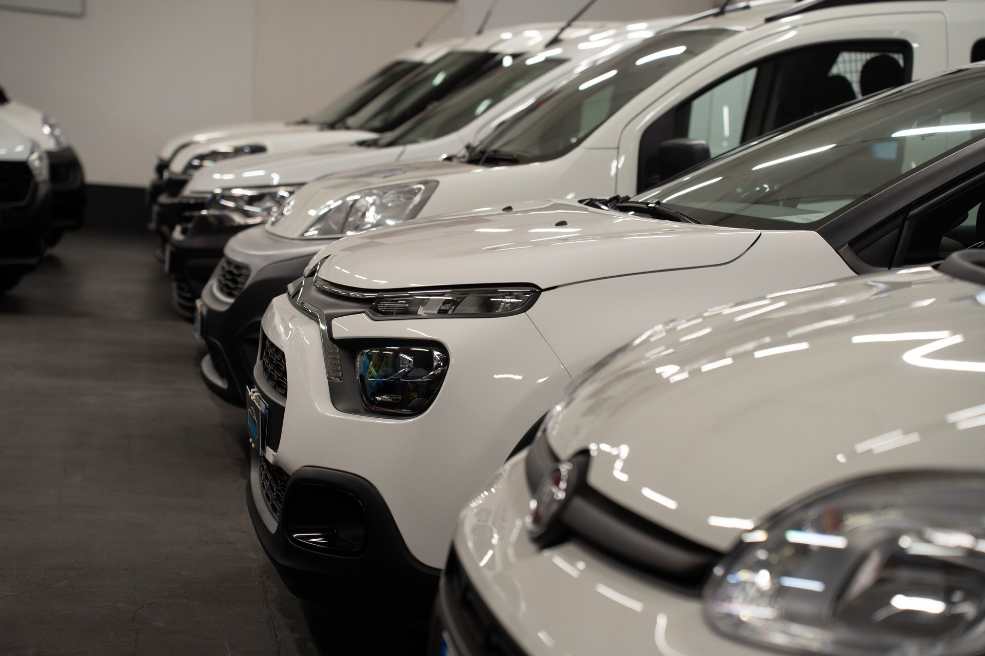 an abstract photo of a curved building with a blue sky in the background