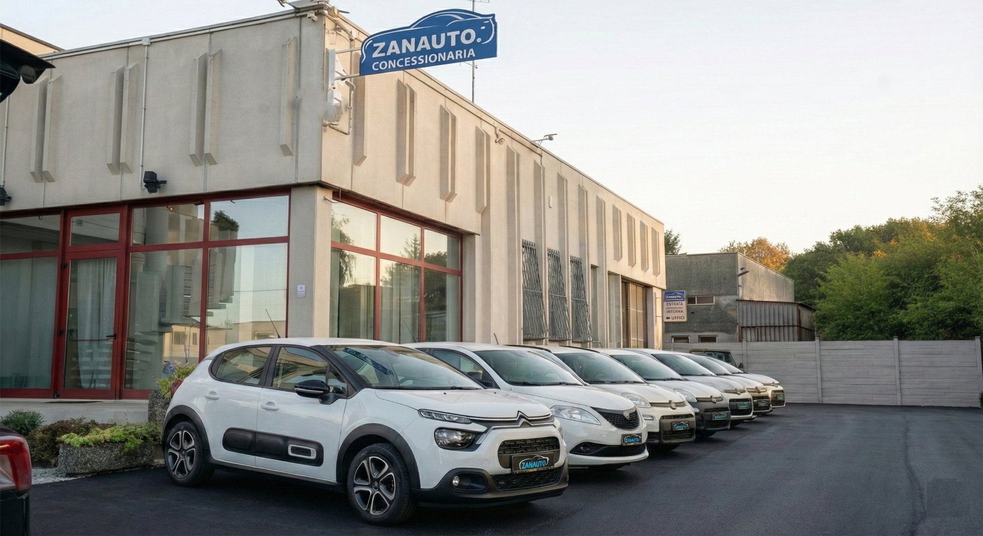 an abstract photo of a curved building with a blue sky in the background