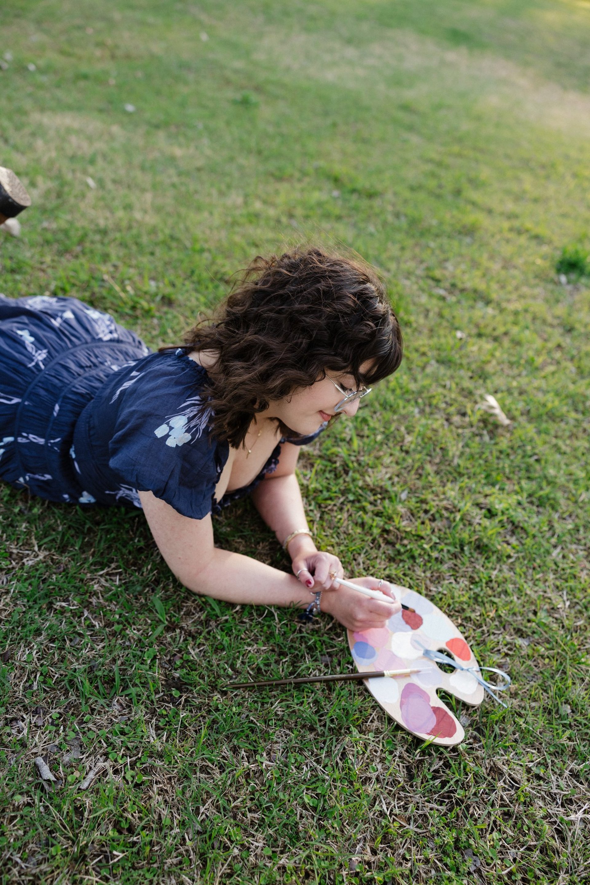 an abstract photo of a curved building with a blue sky in the background