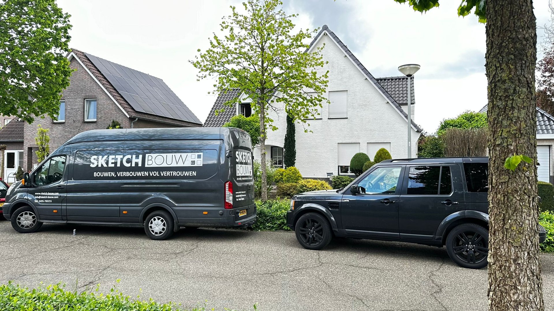 an abstract photo of a curved building with a blue sky in the background