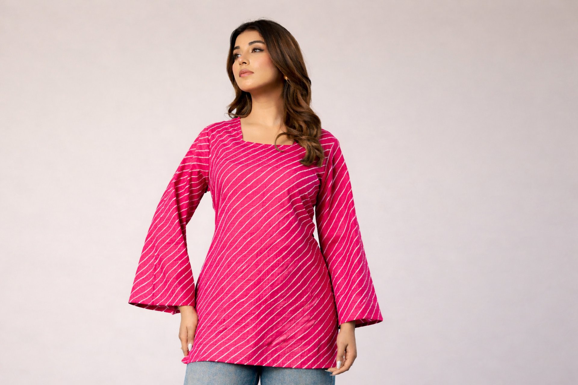 person wearing grey knit sweater