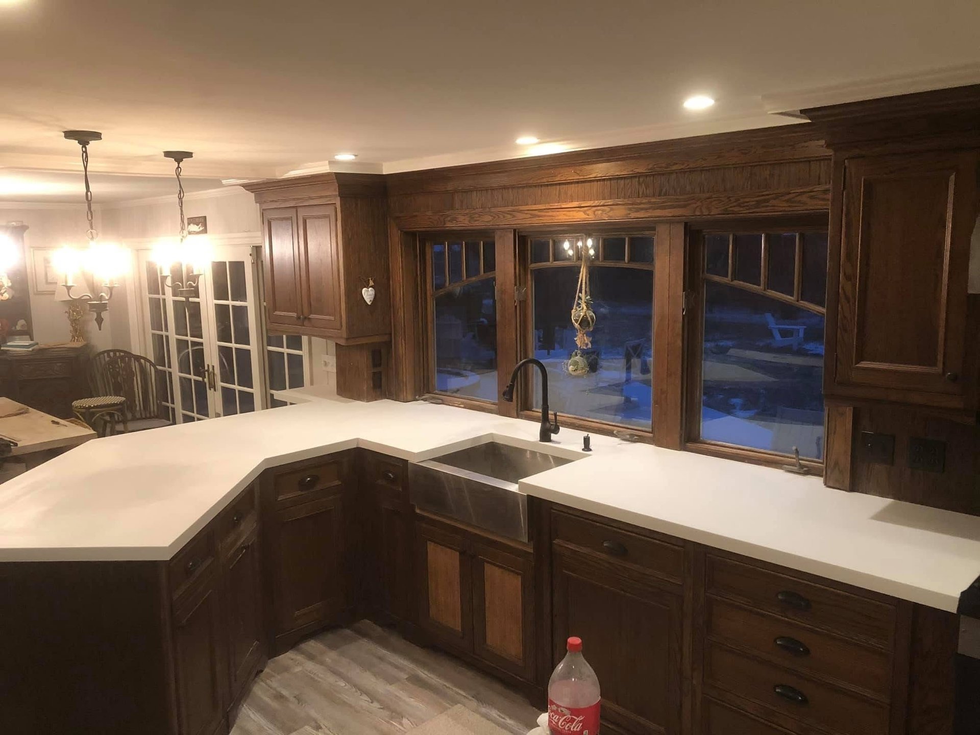 Large tree with log seats and outdoor tables