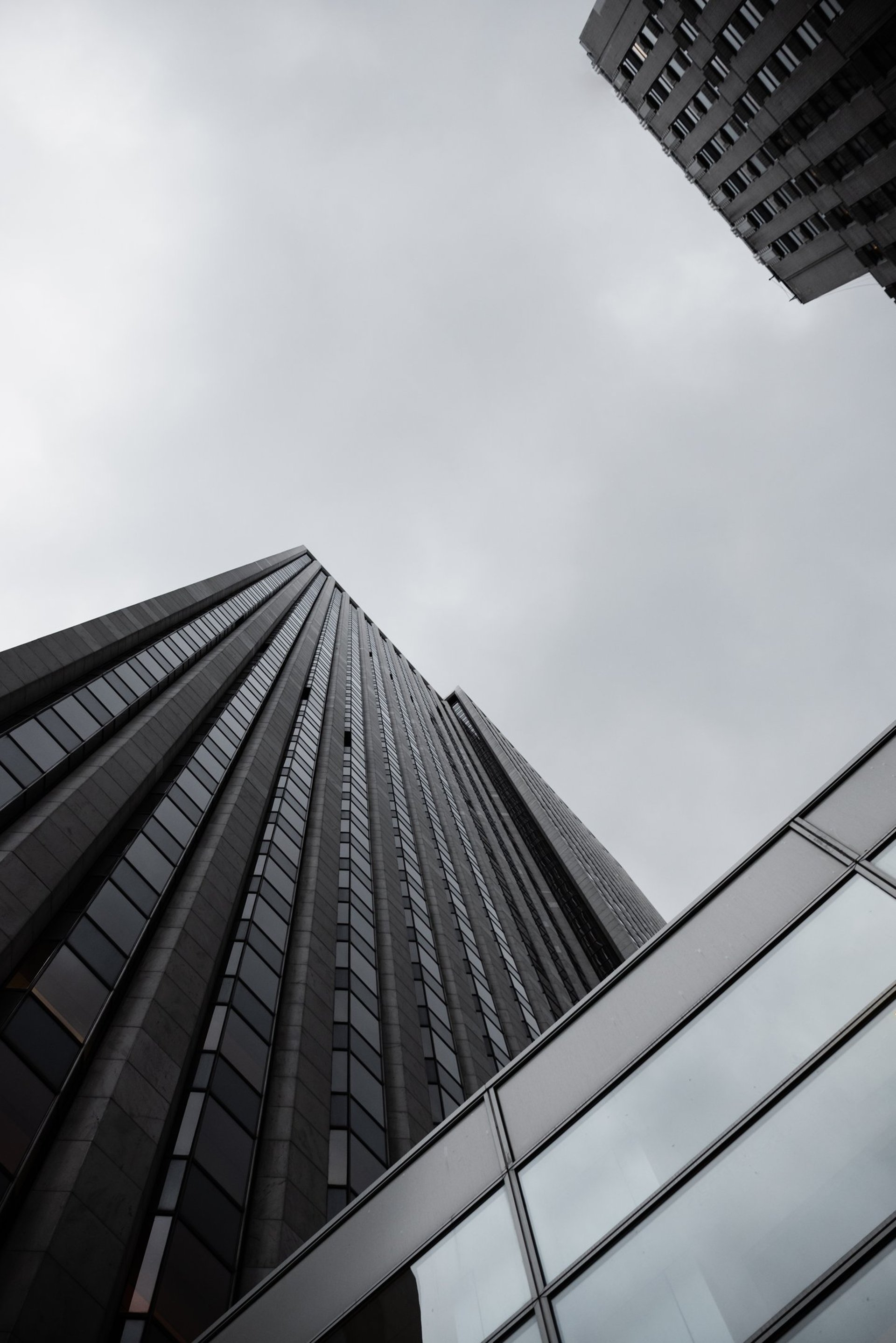 low angle photo of city high rise buildings during daytime