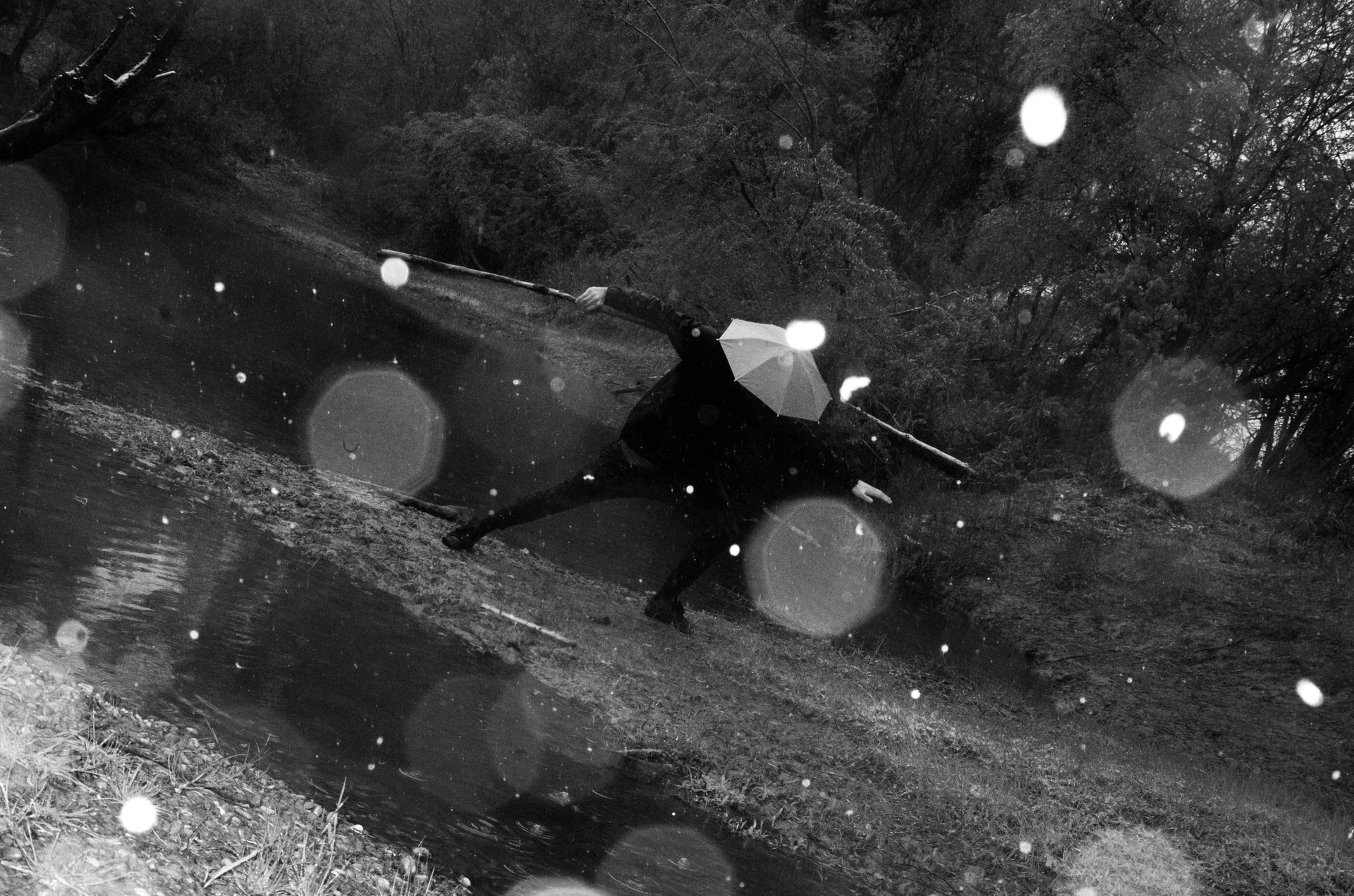 woman wearing yellow long-sleeved dress under white clouds and blue sky during daytime