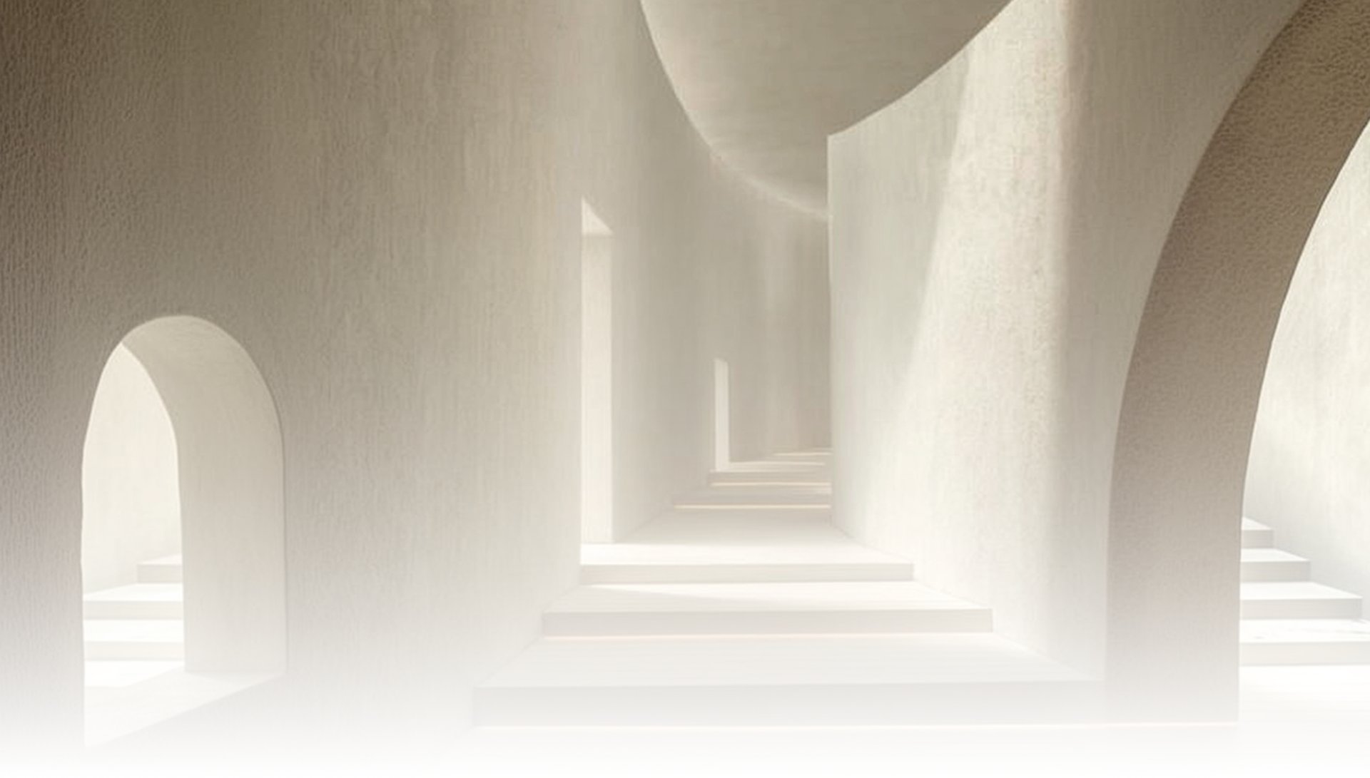 an abstract photo of a curved building with a blue sky in the background