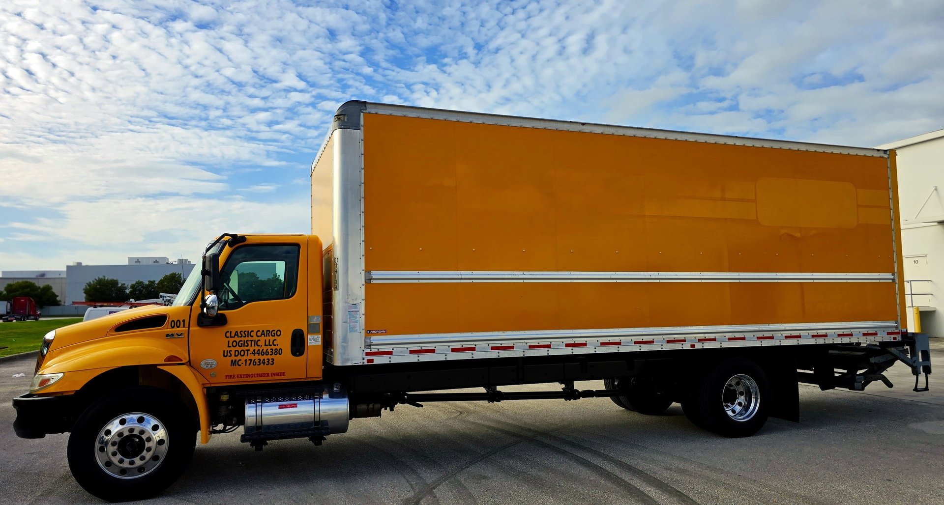 black and brown leather padded tub sofa