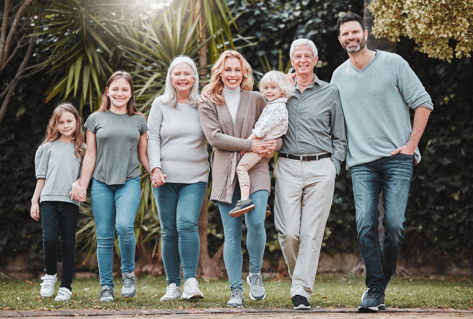 pink cherry blossom tree on green grass field