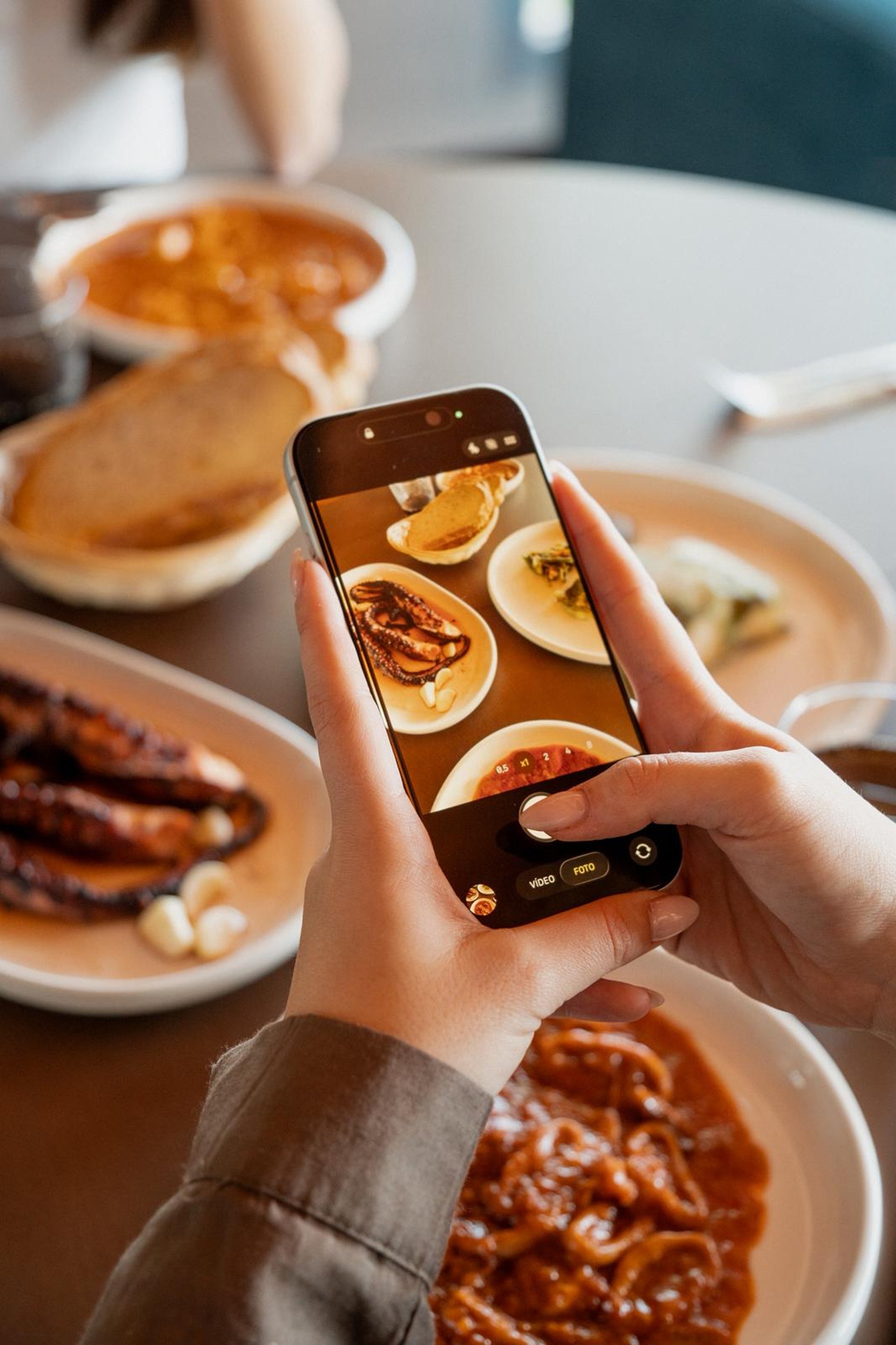 woman wearing yellow long-sleeved dress under white clouds and blue sky during daytime