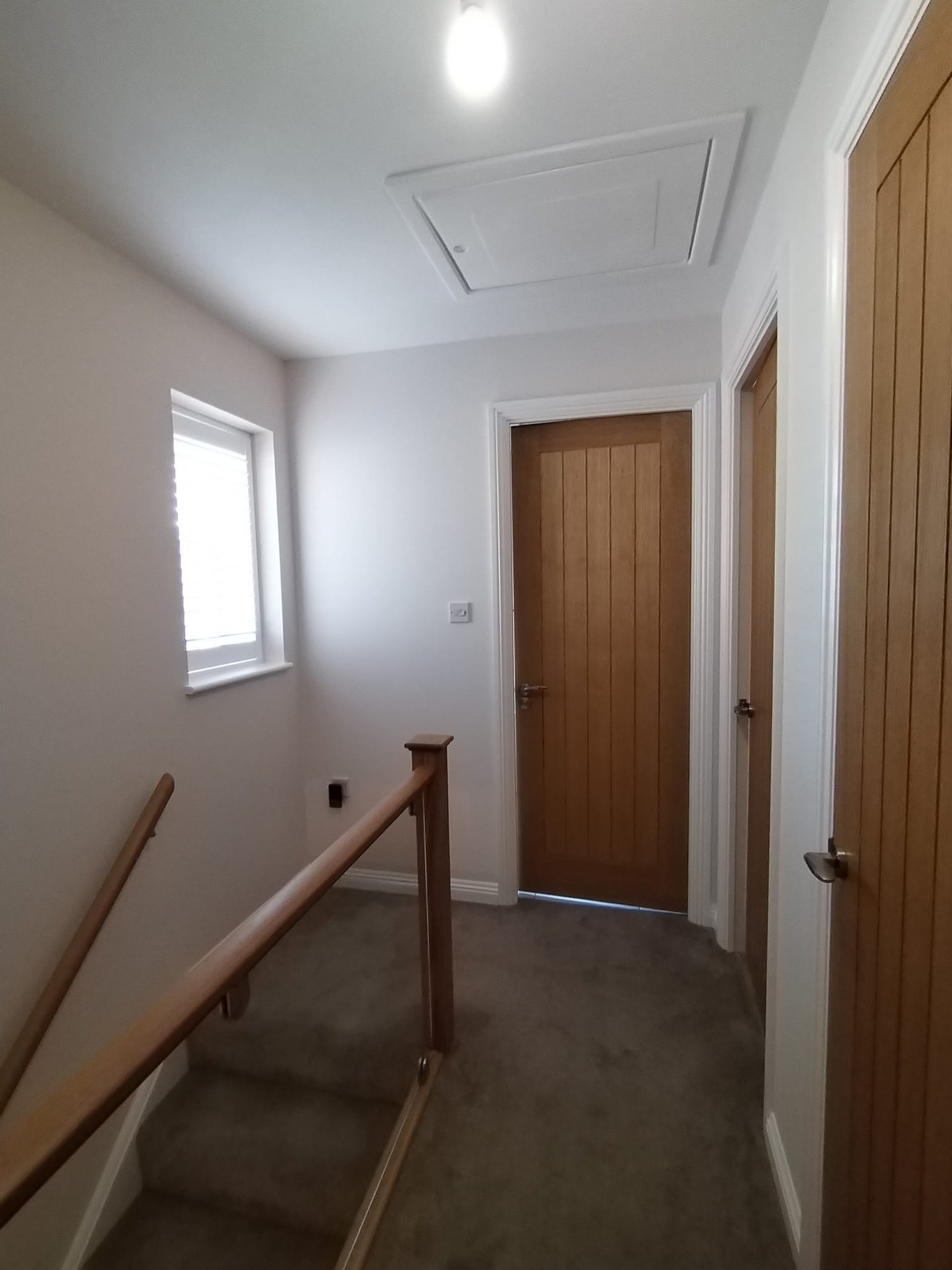 a living room filled with furniture and a mirror