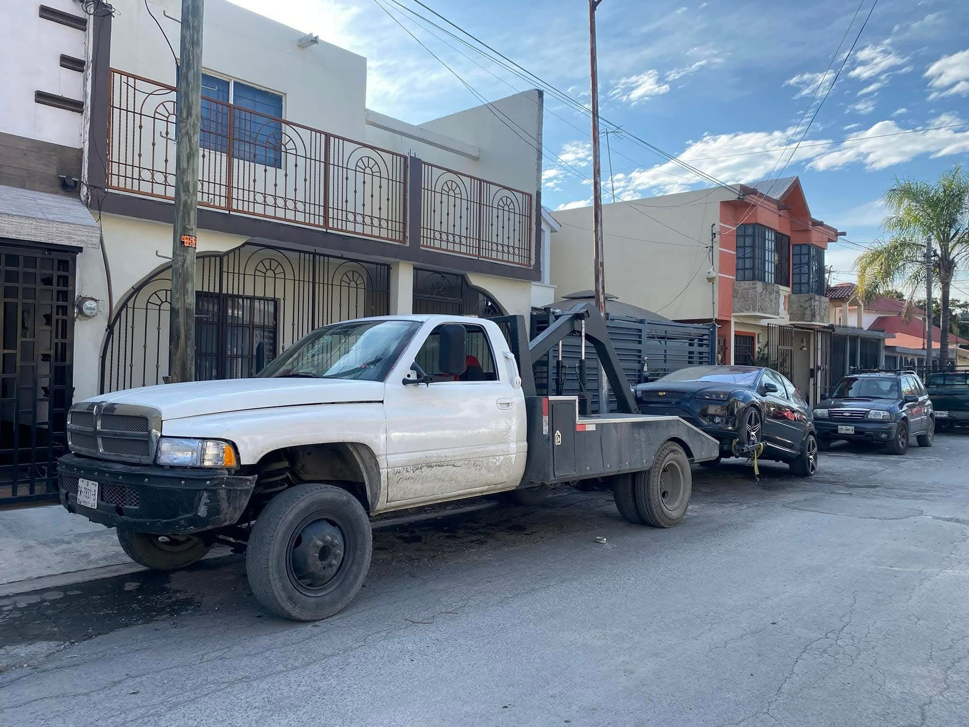 black and brown leather padded tub sofa