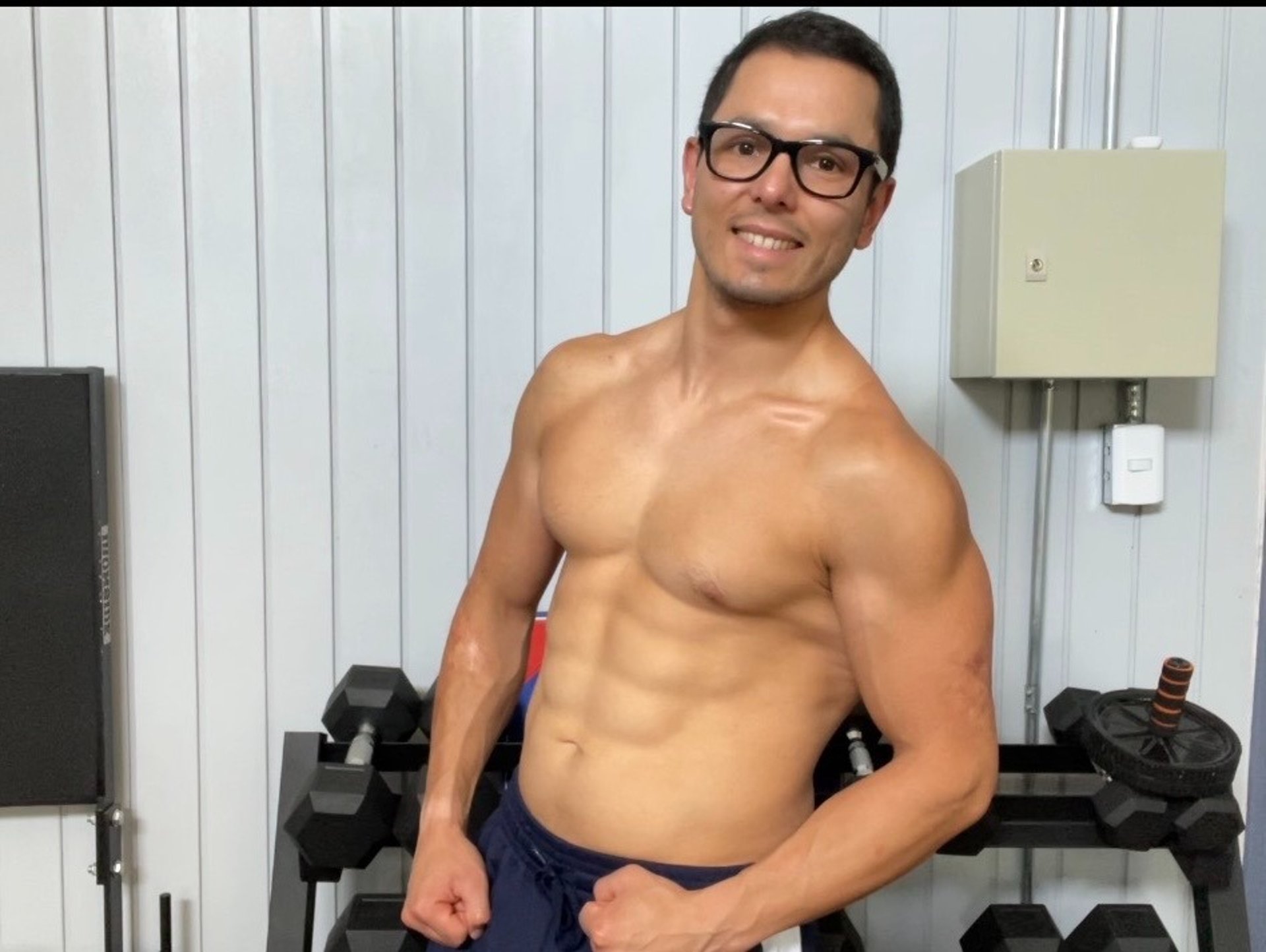 a man is dancing in a living room