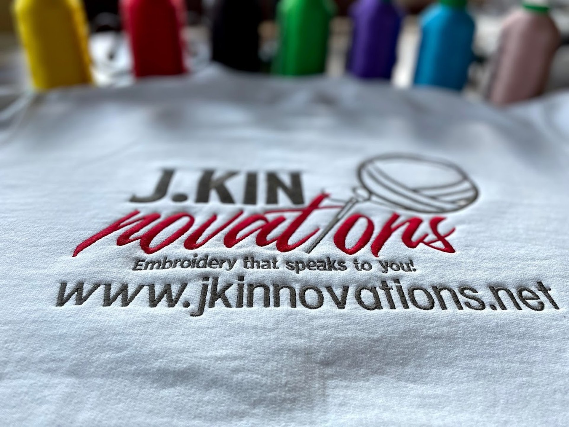 an abstract photo of a curved building with a blue sky in the background