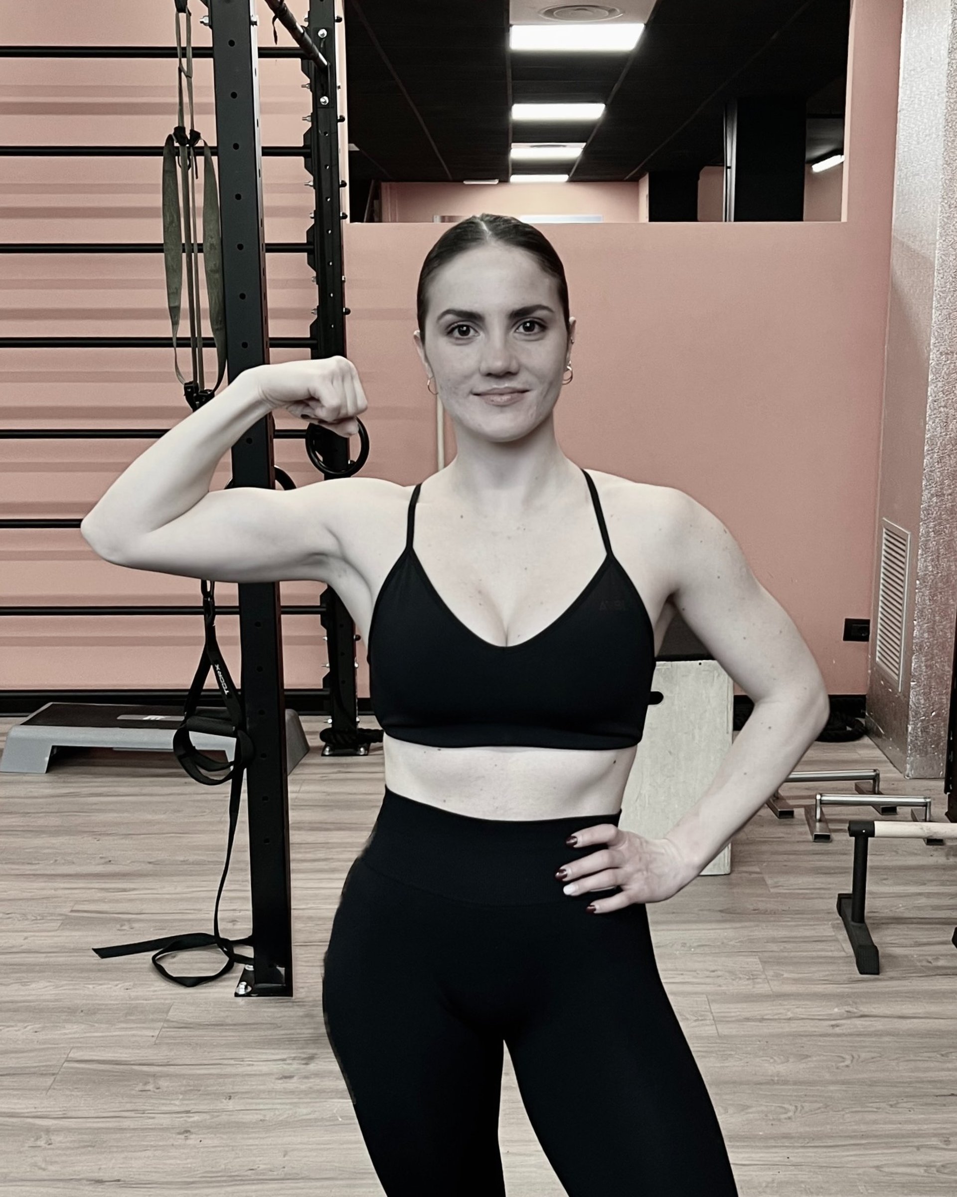 woman in pink sports bra and pink leggings