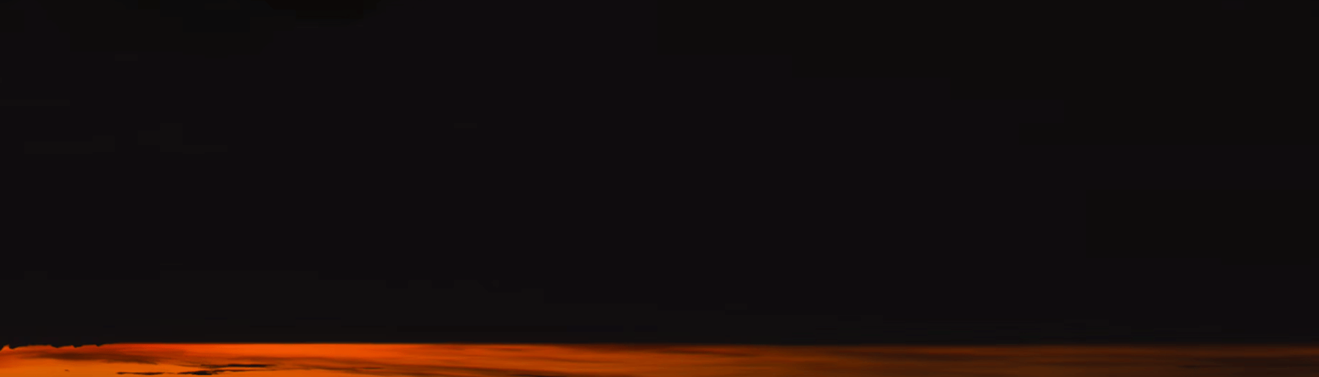 Crescent moon and star over horizon at sunset horizon