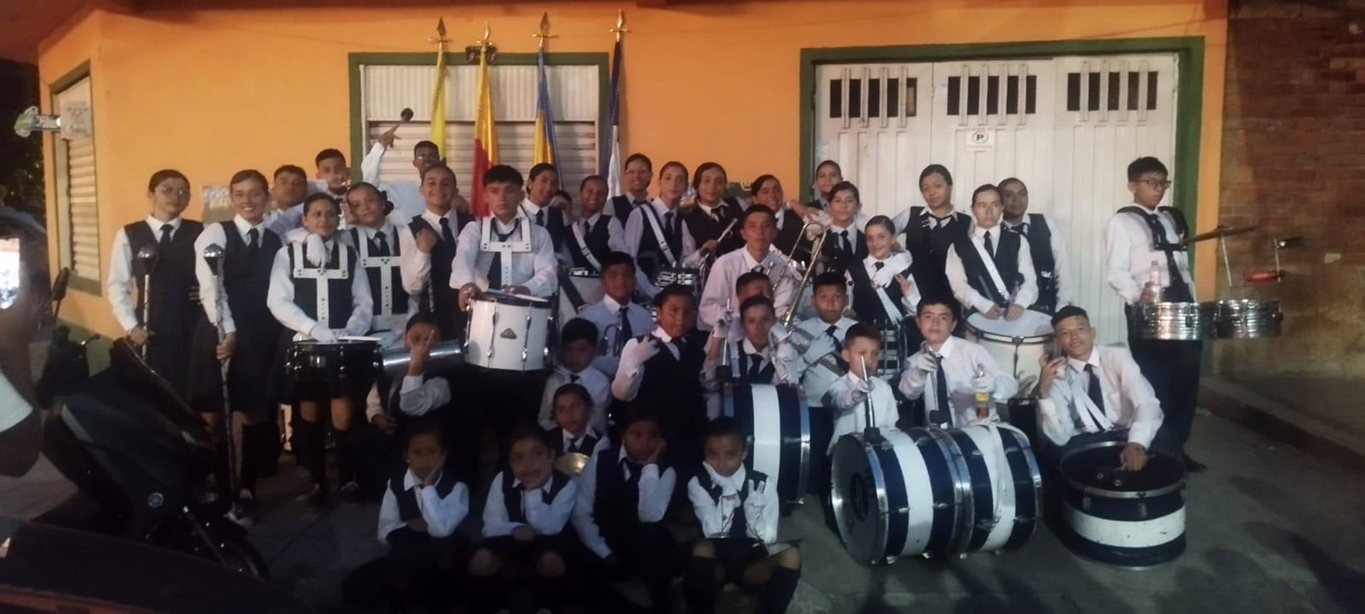 an abstract photo of a curved building with a blue sky in the background