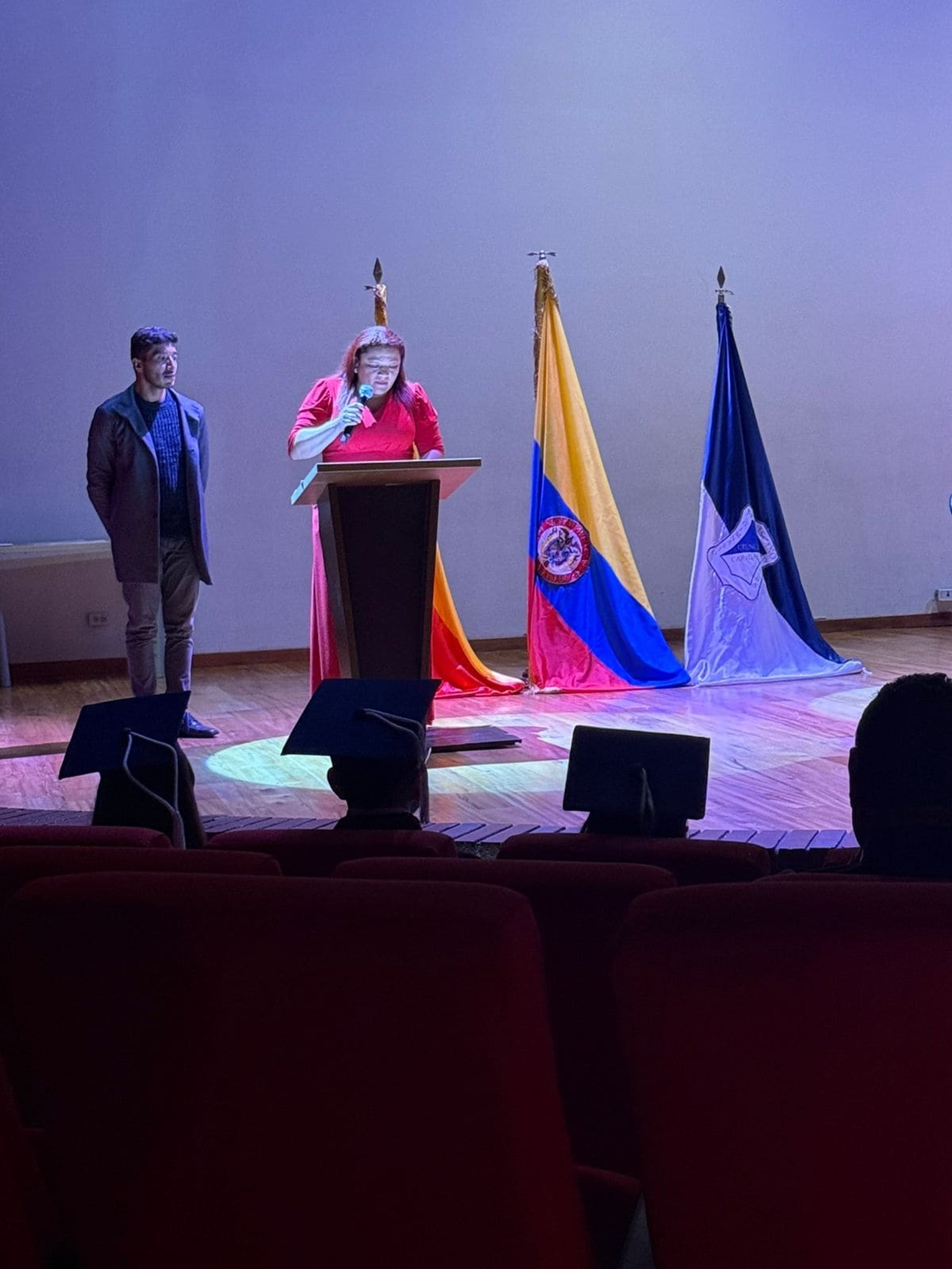 an abstract photo of a curved building with a blue sky in the background
