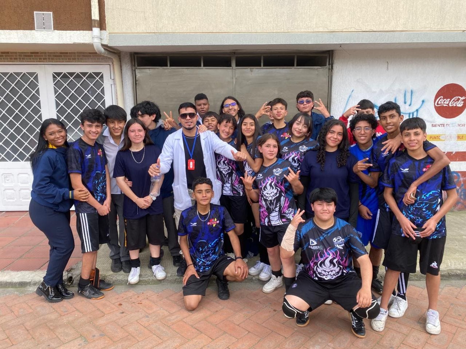 an abstract photo of a curved building with a blue sky in the background