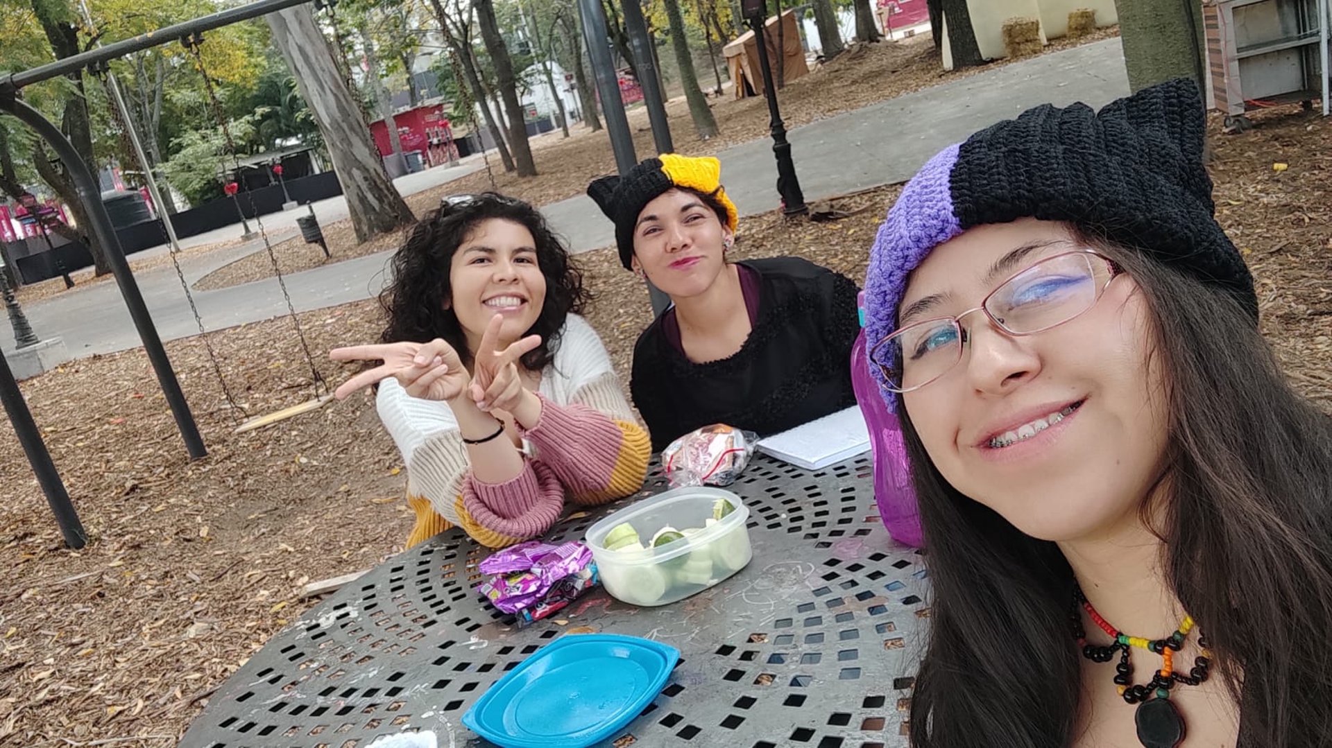 an abstract photo of a curved building with a blue sky in the background