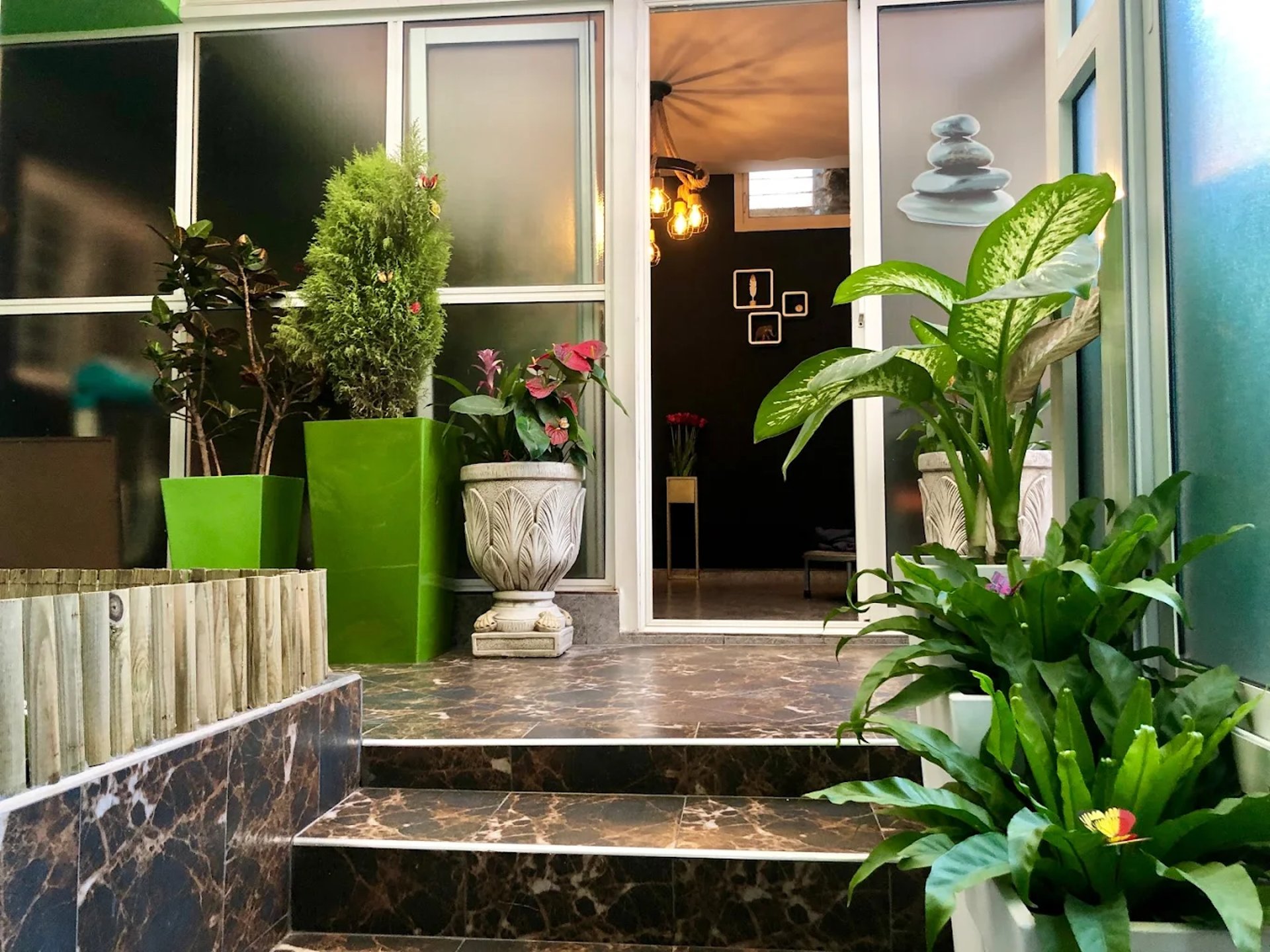 an abstract photo of a curved building with a blue sky in the background