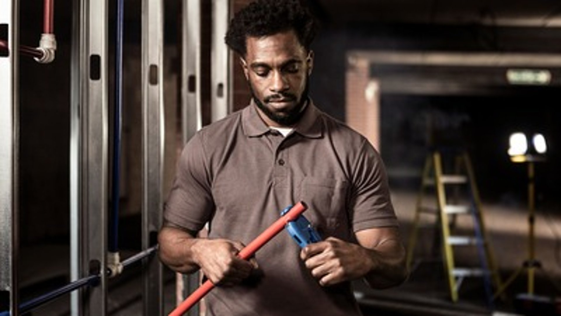 an abstract photo of a curved building with a blue sky in the background