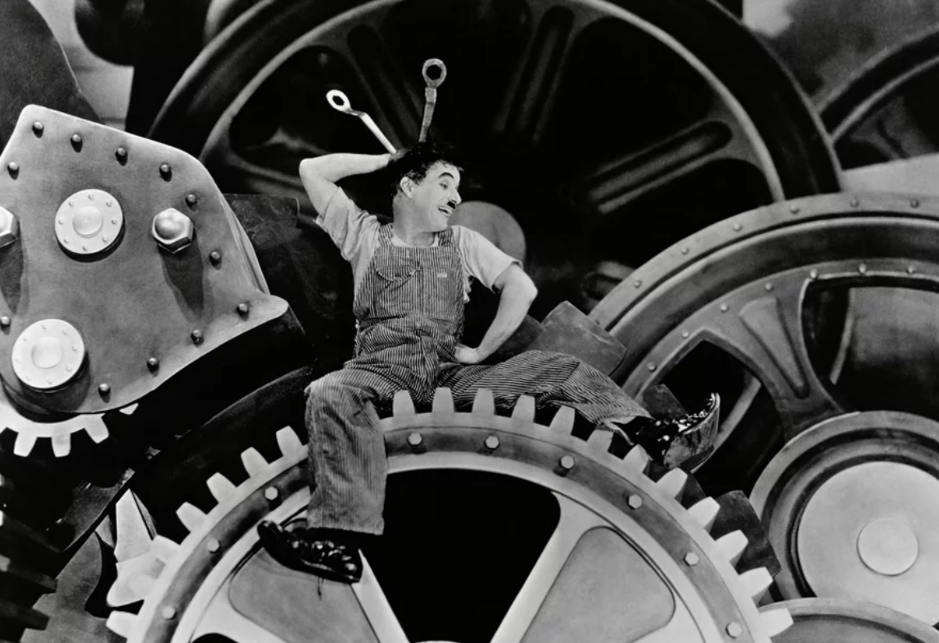 a close up of a black and brown abstract painting