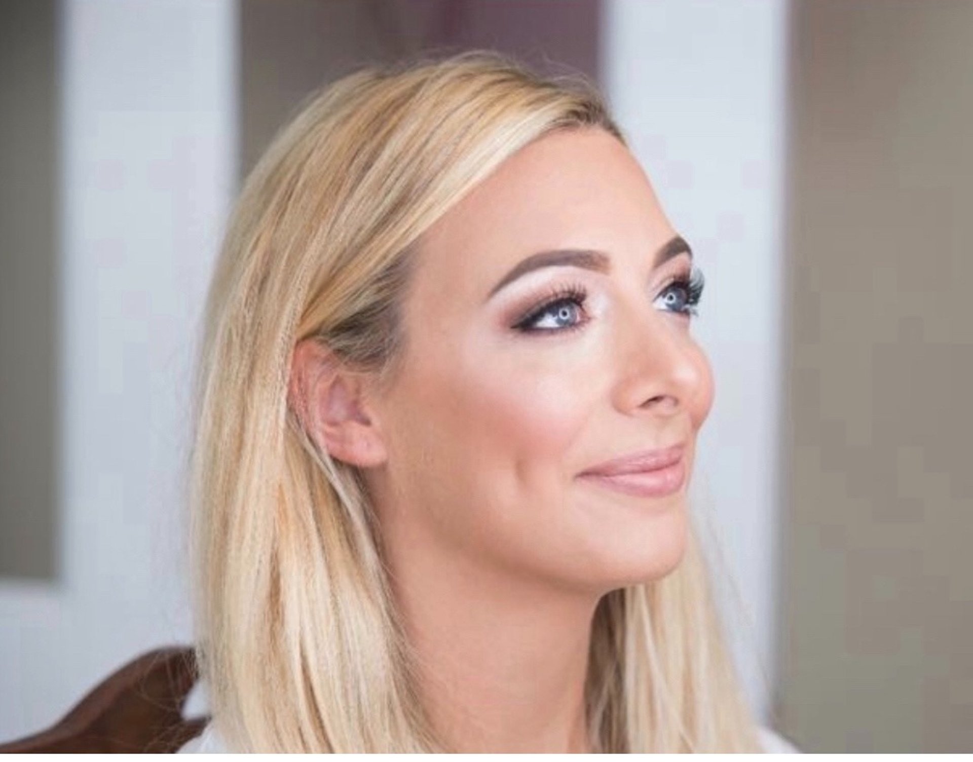 woman wearing yellow long-sleeved dress under white clouds and blue sky during daytime