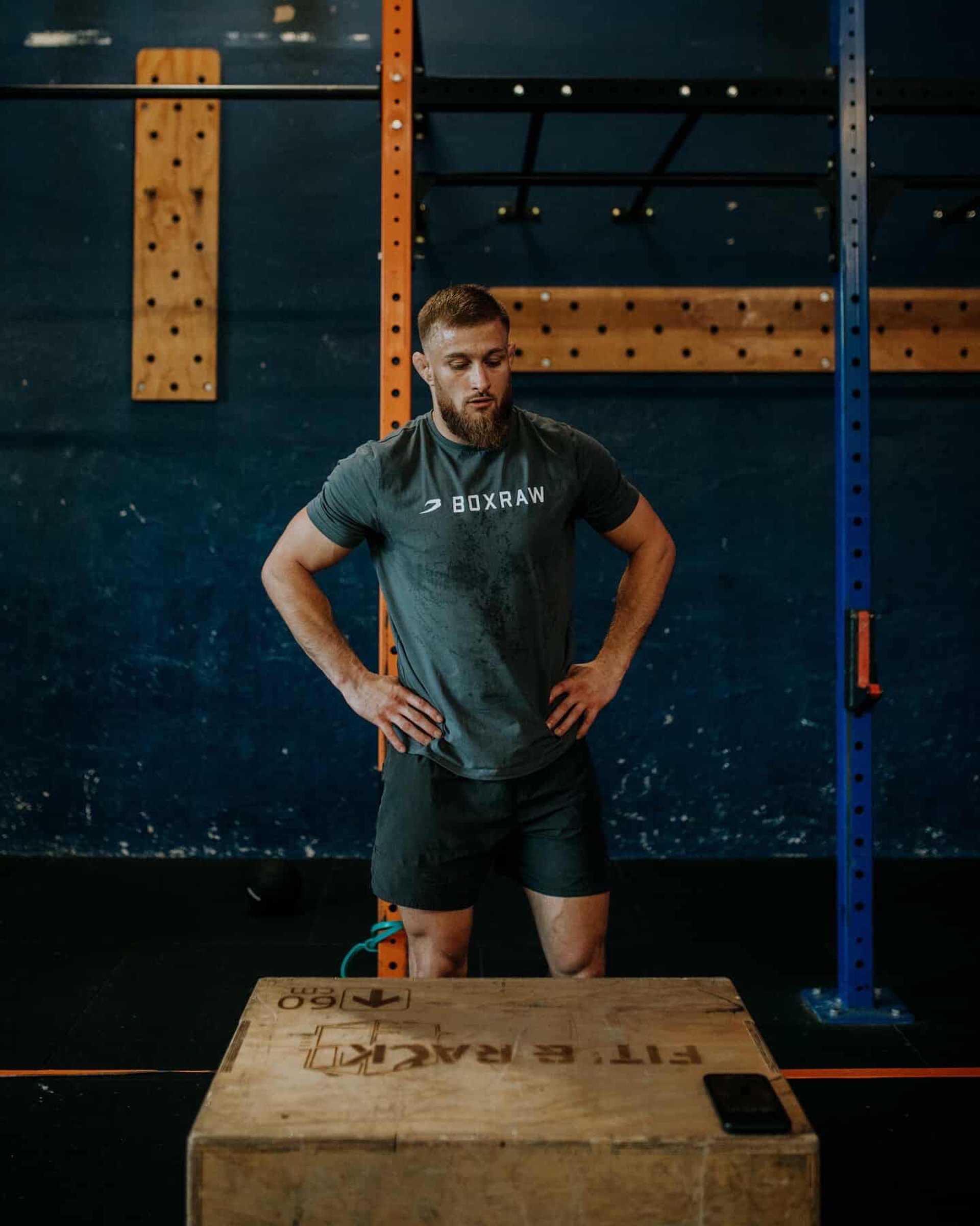an abstract photo of a curved building with a blue sky in the background