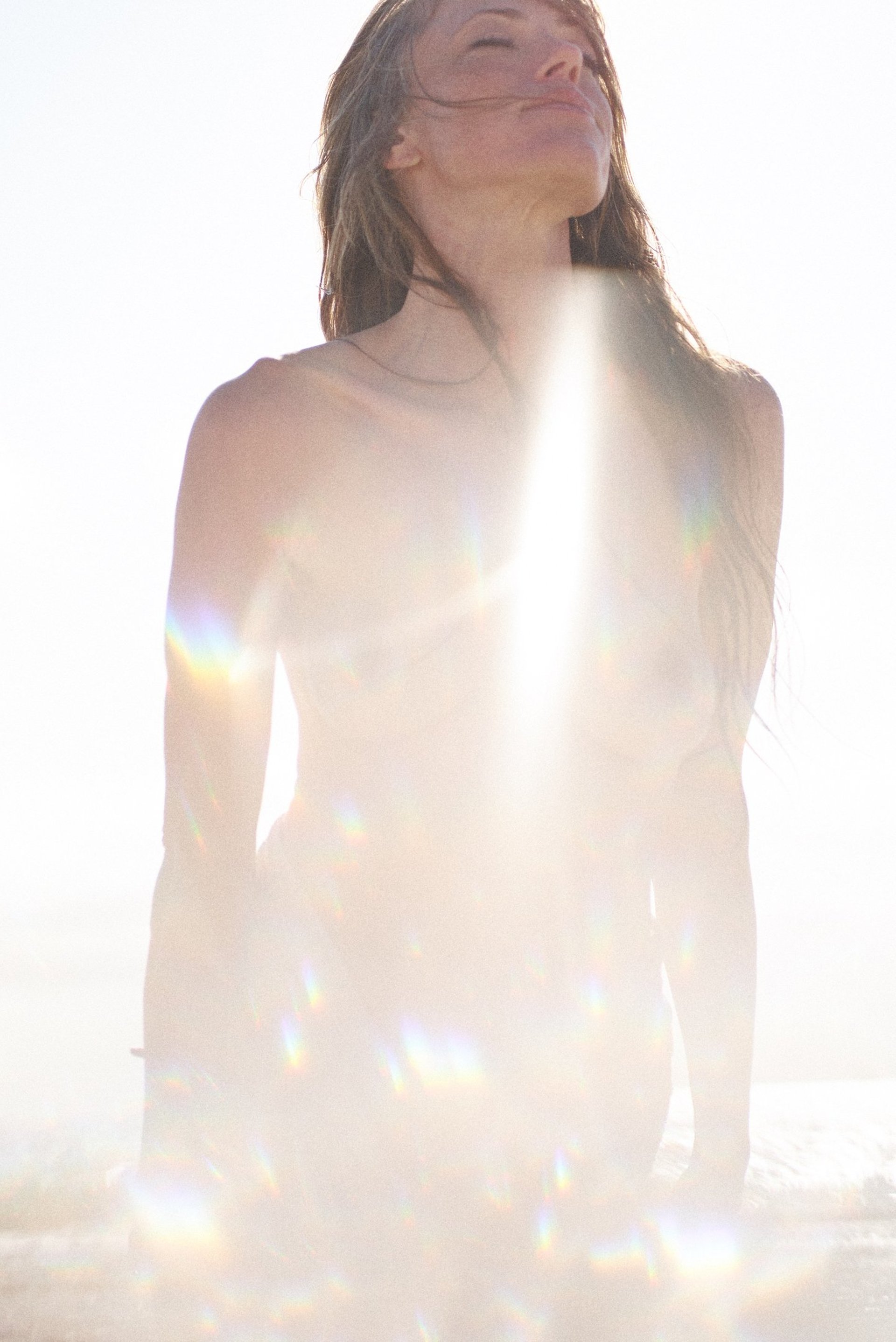 woman holding dried flower